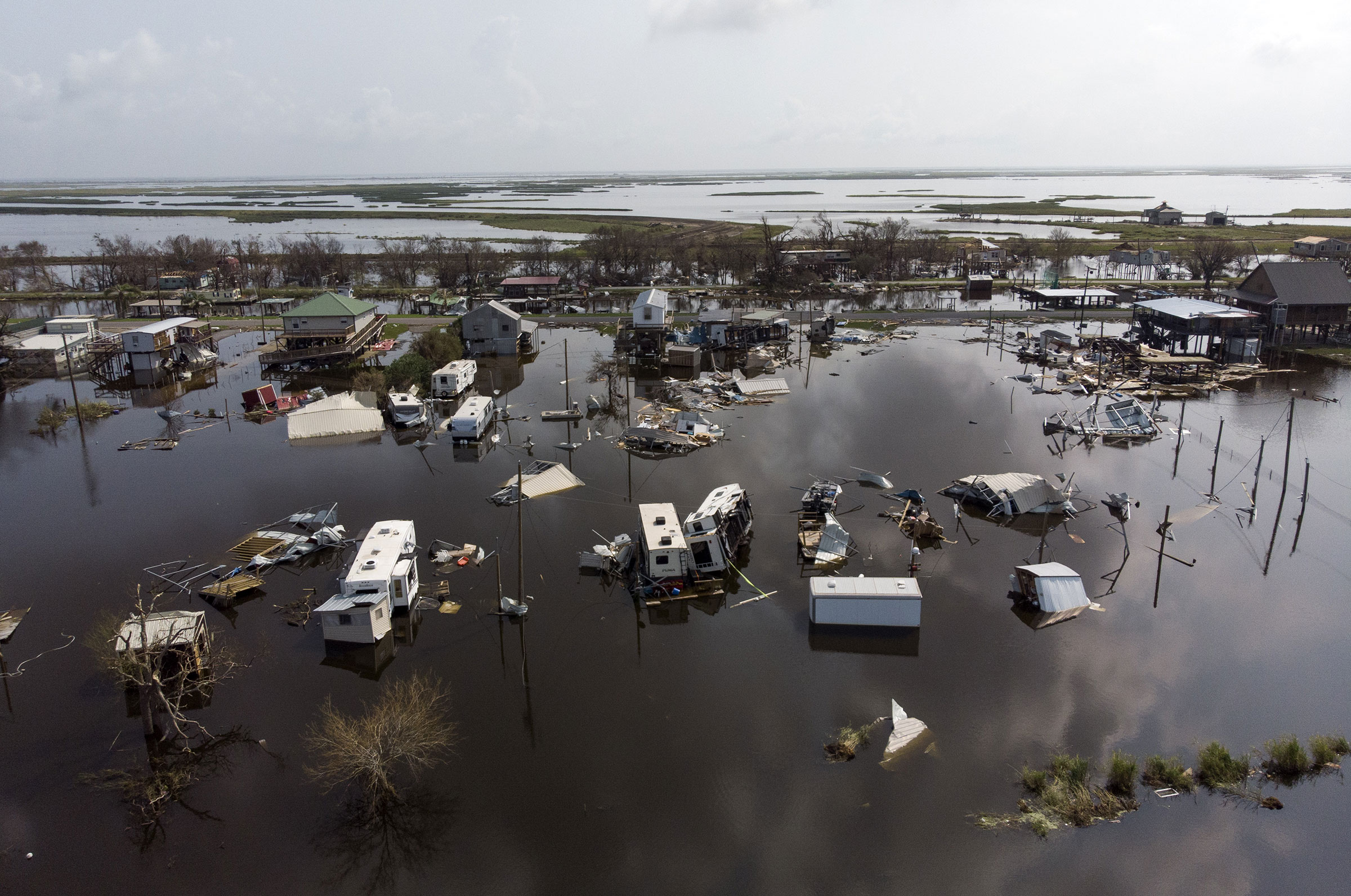Damaged homes in floodwater after Hurricane Ida in Pointe-Aux-Chenes, Louisiana, U.S., on Thursday, Sept. 2, 2021. (Mark Felix—Bloomberg/Getty Images)
