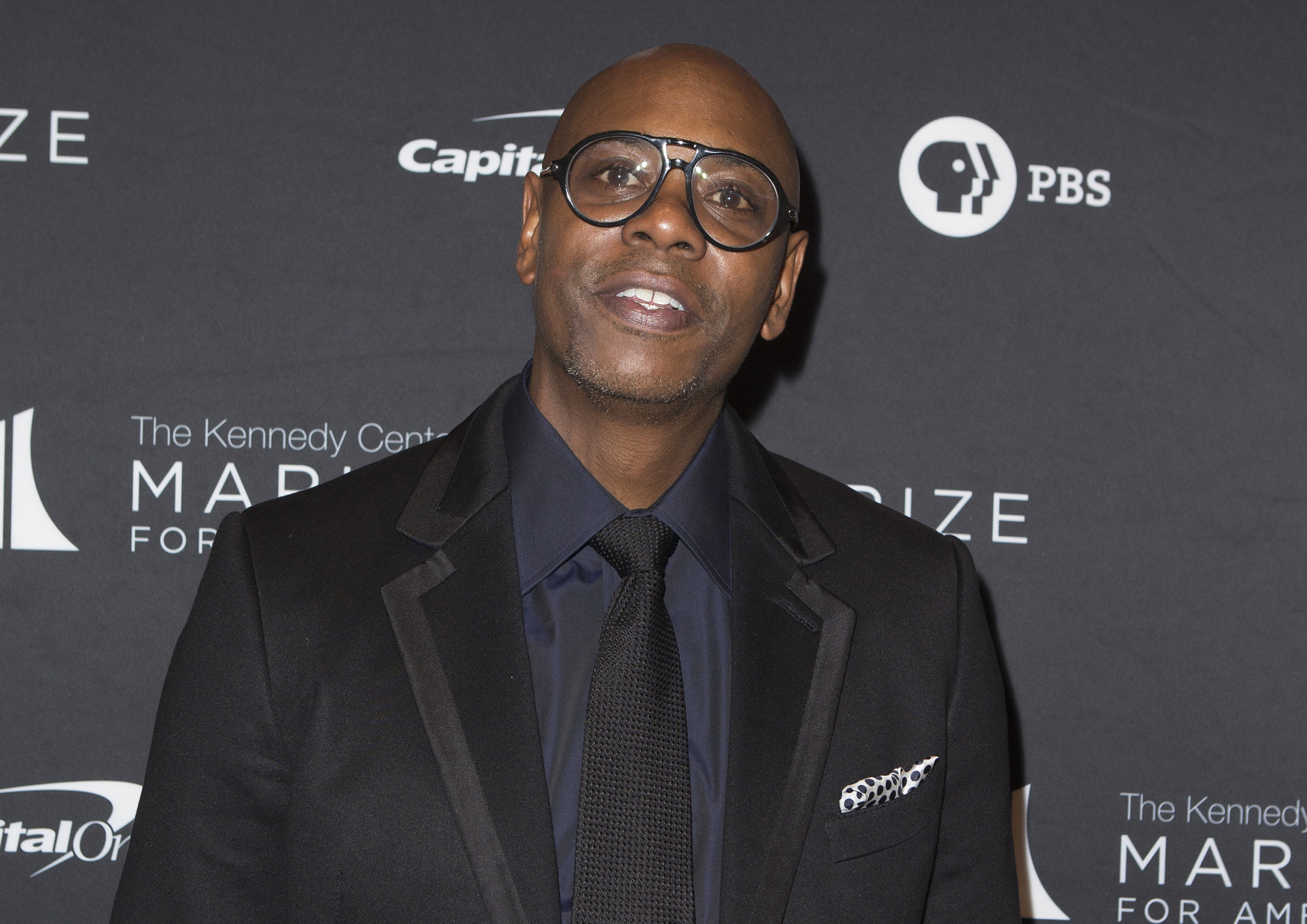 Netflix Defends Dave Chappelle's Anti-Trans Remarks | Time