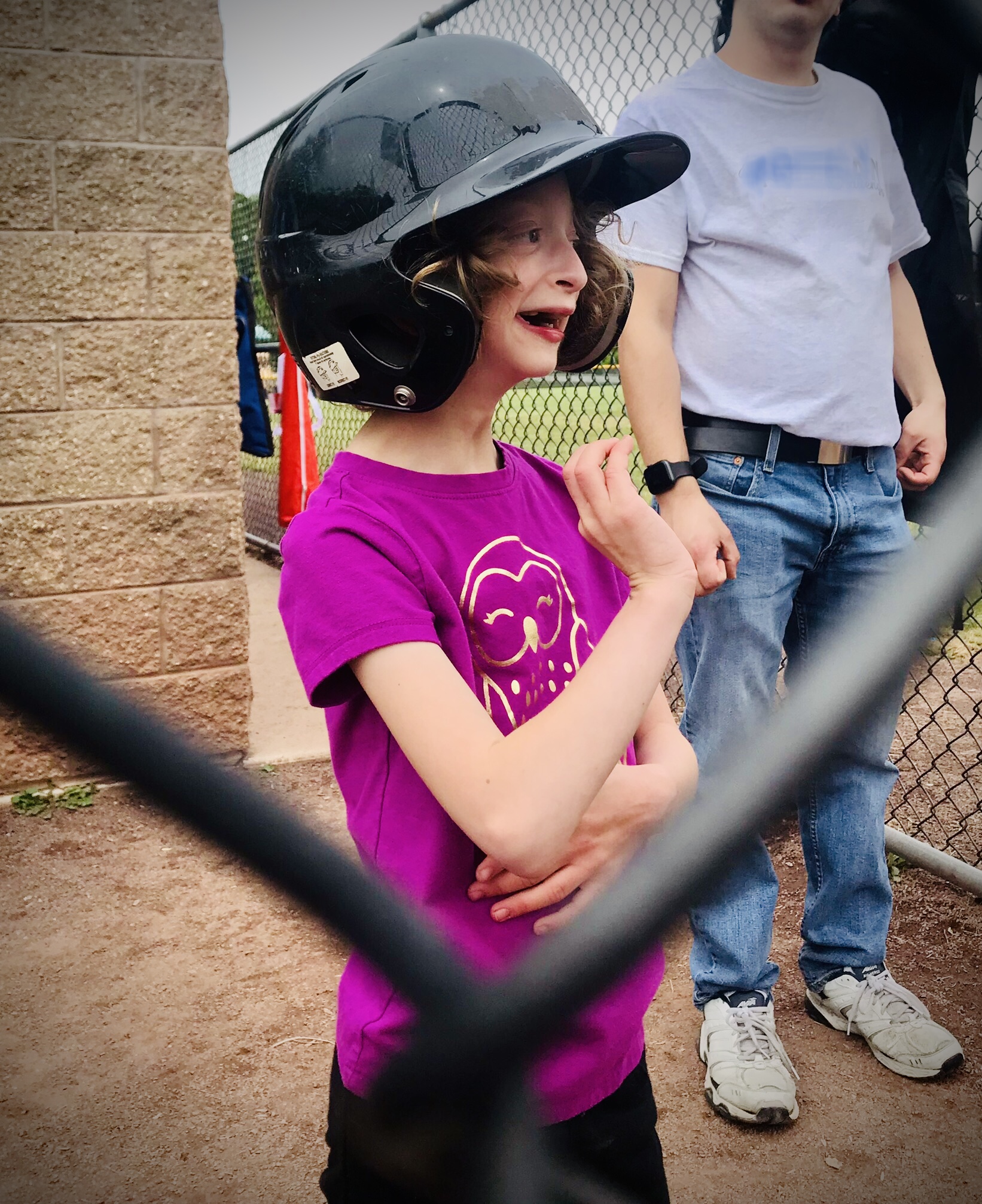 Fiona at a little league baseball game. (Courtesy of Heather Lanier)