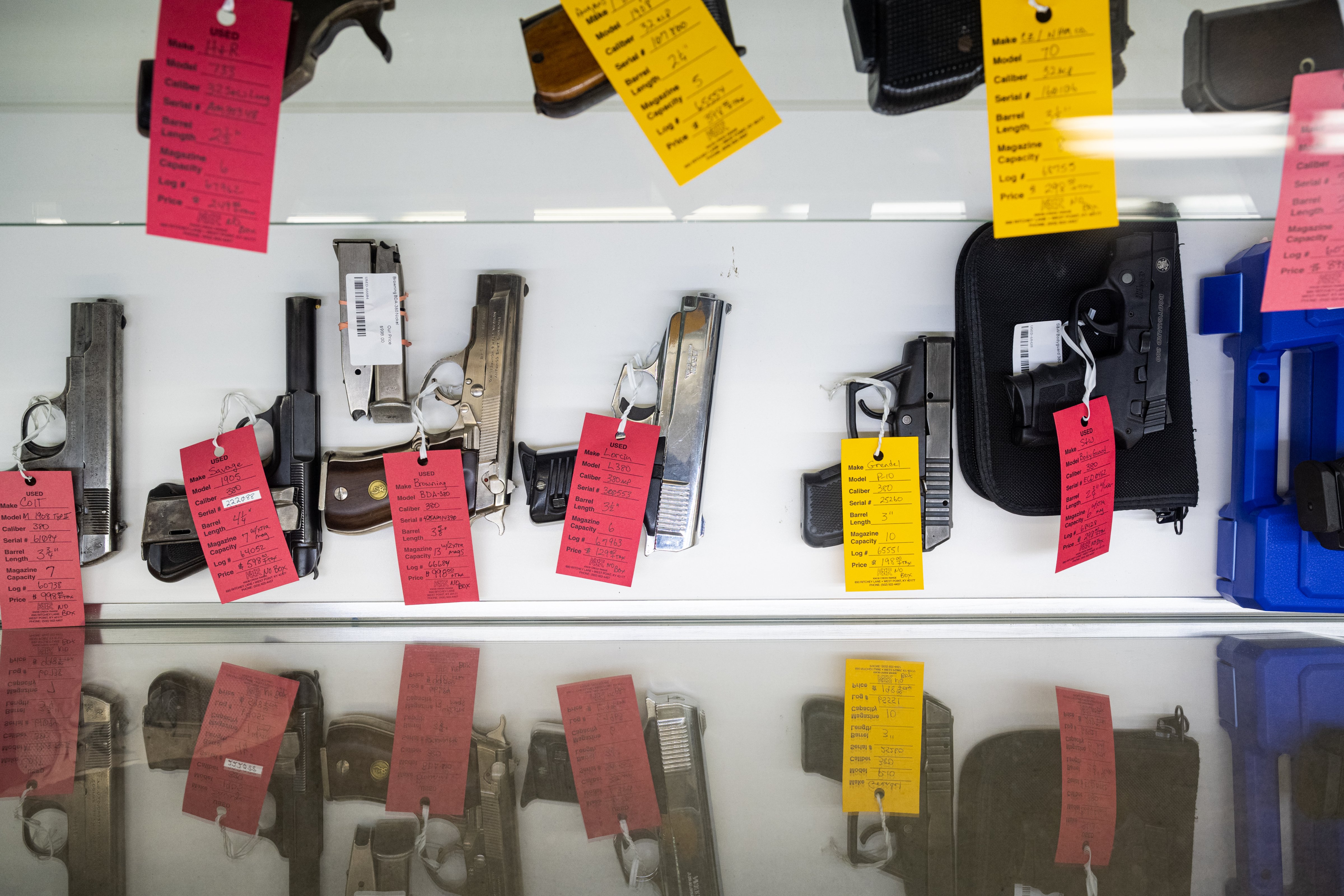 Handguns for sale are displayed at the Knob Creek Gun Range store in West Point, Kentucky, on July 22, 2021. The Supreme Court will hear arguments on a case that could make it easier for Americans to carry concealed handguns. (Jon Cherry—Bloomberg/Getty Images)