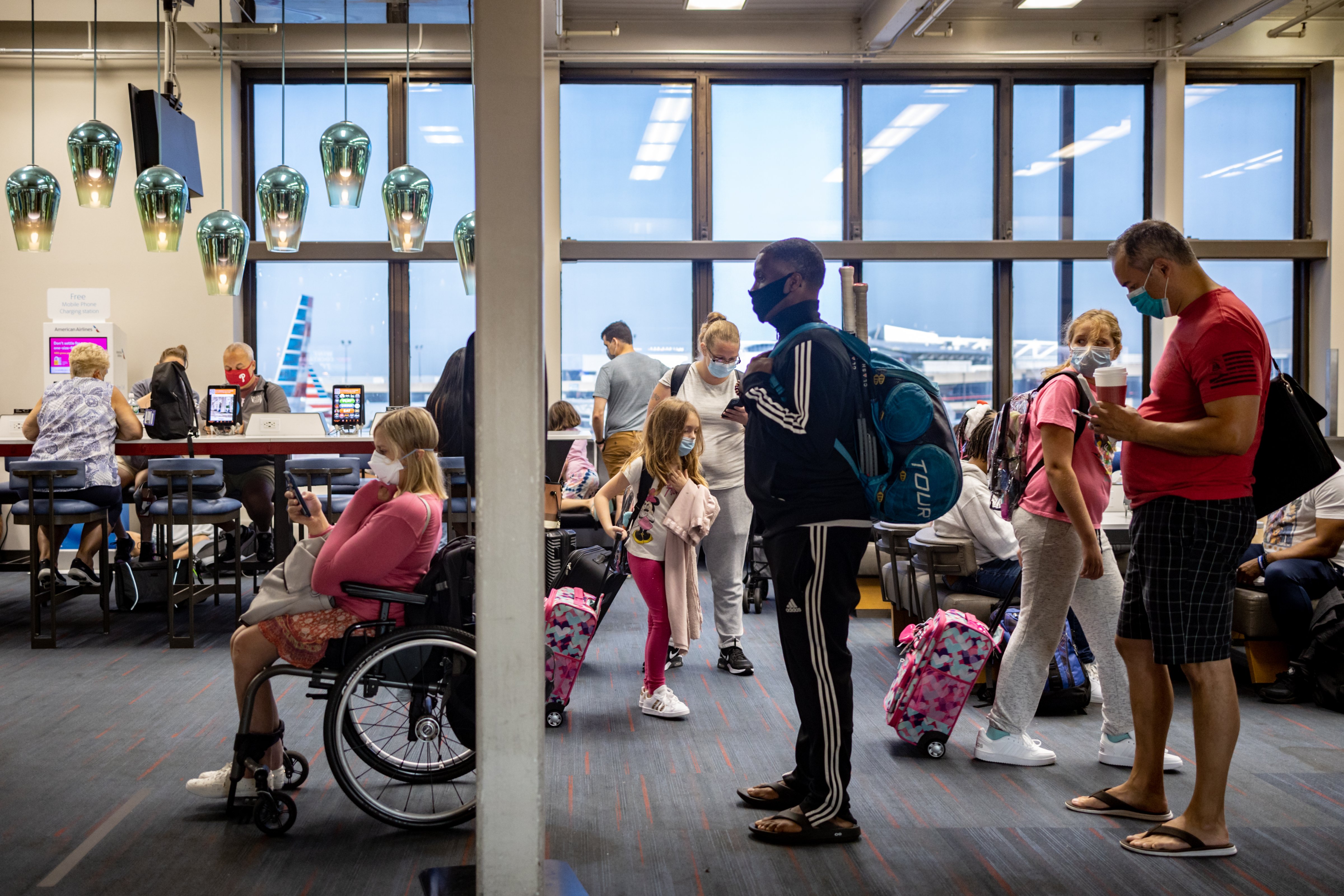 Travelers wait to board a flight at Philadelphia International Airport on Aug. 6, 2021. (Hannah Beier—Bloomberg/Getty Images)