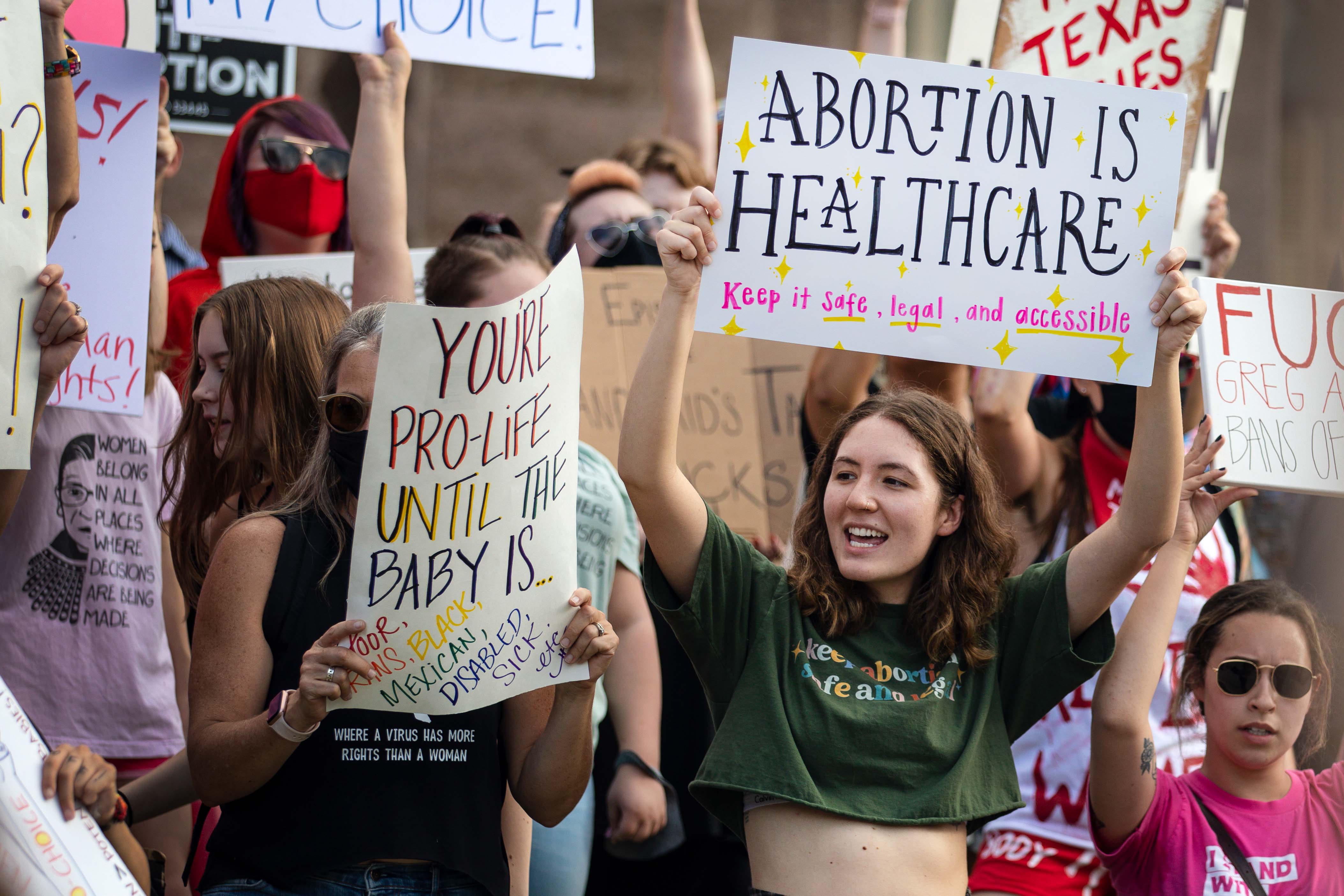 Demonstrators rally against anti-abortion and voter suppression laws at the Texas State Capitol on October 2 (Montinique Monroe—Getty Images)