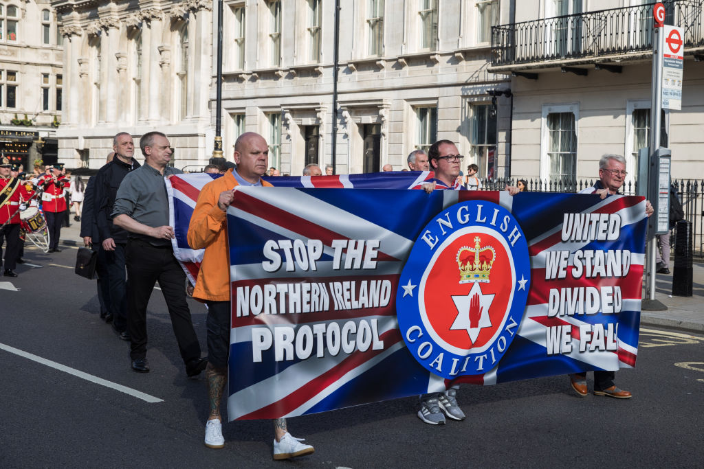 Loyalists march to Downing Street via Parliament Square to demonstrate against the Northern Ireland Protocol between the United Kingdom and the European Union on 9th October 2021 in London, United Kingdom. The Northern Ireland Protocol was agreed in Brexit talks between the UK and the EU in order to protect the 1998 Good Friday Agreement and it was implemented so as to avoid a hard border between Northern Ireland and the Republic of Ireland. (Mark Kerrison-In Pictures)