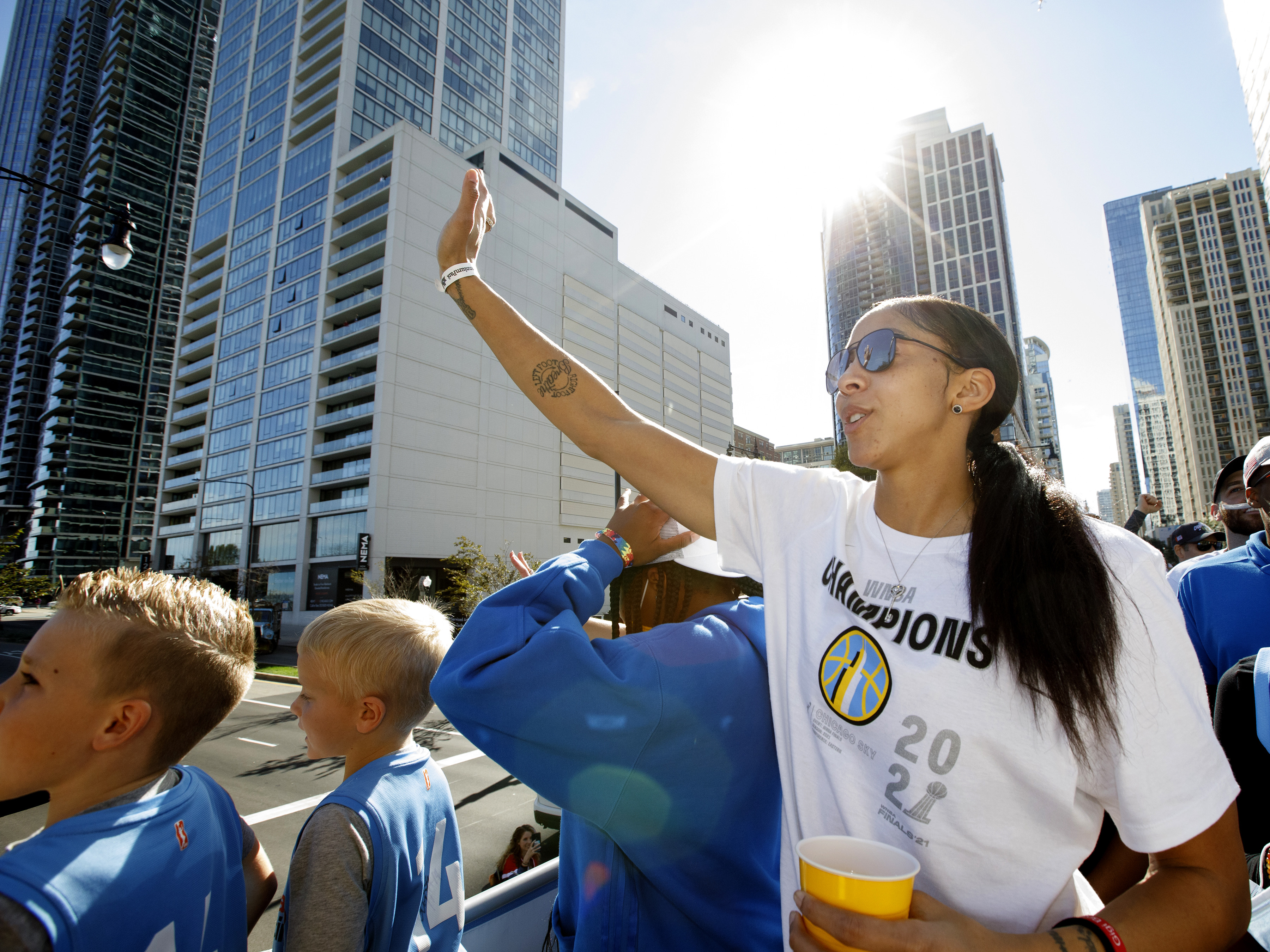 Candace Parker of the Chicago Sky waves to fans during the 2021 Chicago Sky Championship Parade on October 19, 2021 in Chicago, Illinois. (NBAE via Getty Images—2021 NBAE)