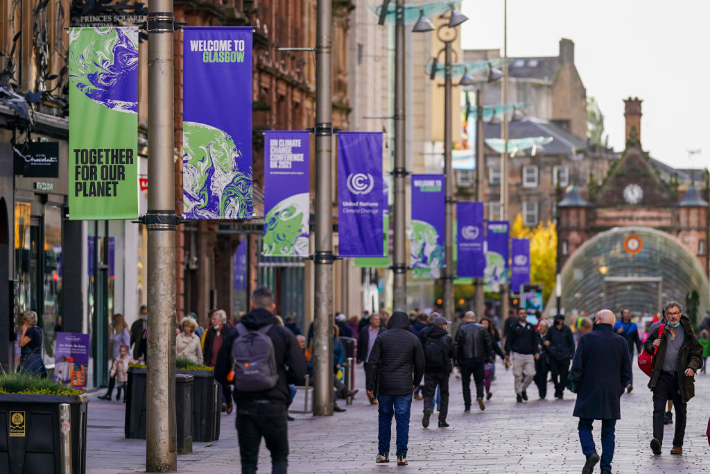Banners advertising the upcoming COP26 climate talks line a precinct in Glasgow, U.K., on Wednesday, Oct. 20, 2021. (Ian Forsyth—Bloomberg/Getty Images)