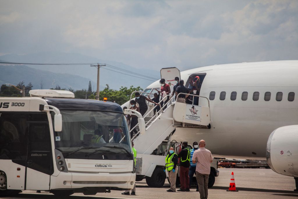 Haitian migrants expelled from the U.S. arrive on September 19, 2021 at the airport in Port au Prince. ((Photo by Richard Pierrin / AFP))