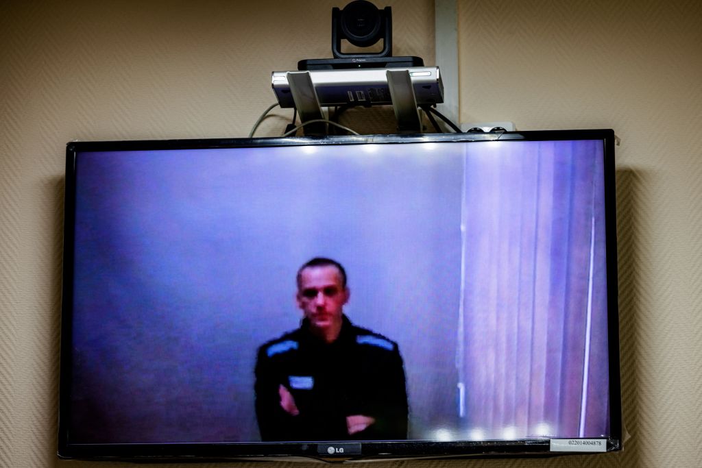 Jailed Kremlin critic Alexei Navalny appears on screen via a video link from prison during a court hearing, at a court in the town of Petushki some 120 kilometres outside Moscow, on May 26, 2021. (Dimitar Dilkoff—AFP/Getty Images)