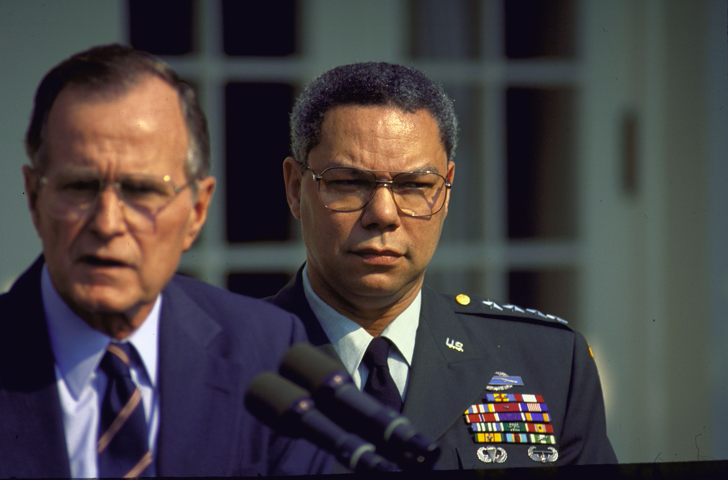 Pres. Bush announcing re-appointment of his Chairman of Joint Chiefs of Staff, Gen. Colin Powell, 1991.