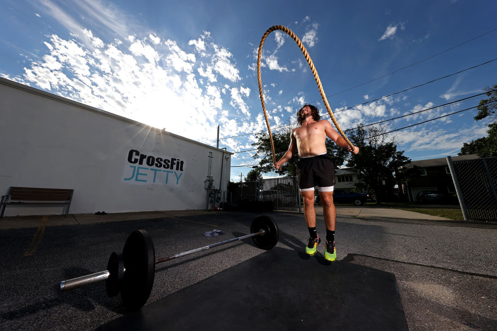 A man jumps rope during an outdoor CrossFit workout in Oceanside, New York on July 20, 2020. (Al Bello/Getty Images)