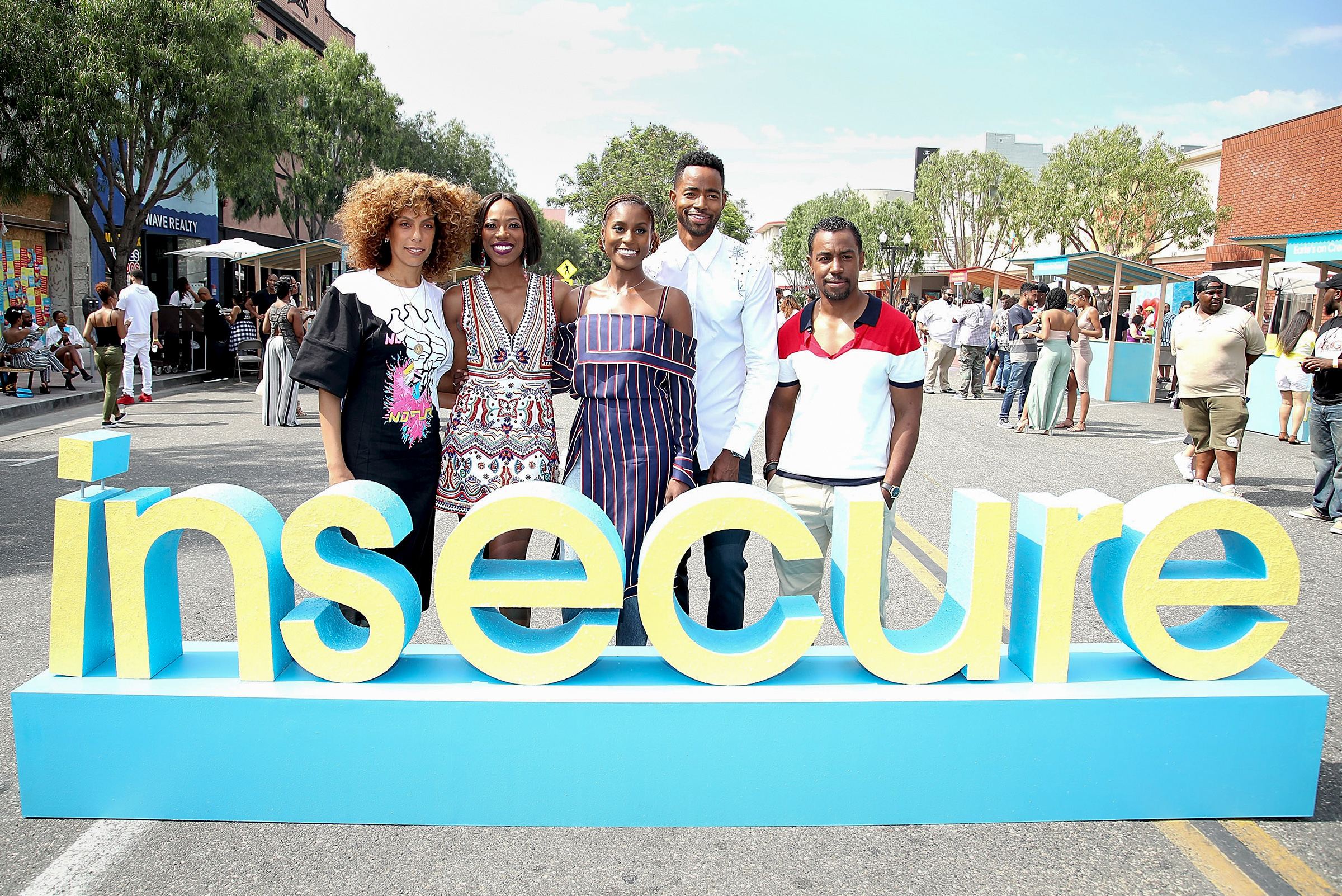 From left: Director Melina Matsoukas, Yvonne Orji, Issa Rae, Jay Ellis and Executive Producer Prentice Penny celebrate the second season of Insecure with a block party in Inglewood, Calif. on July 15, 2017. (Randy Shropshire—Getty Images/HBO)