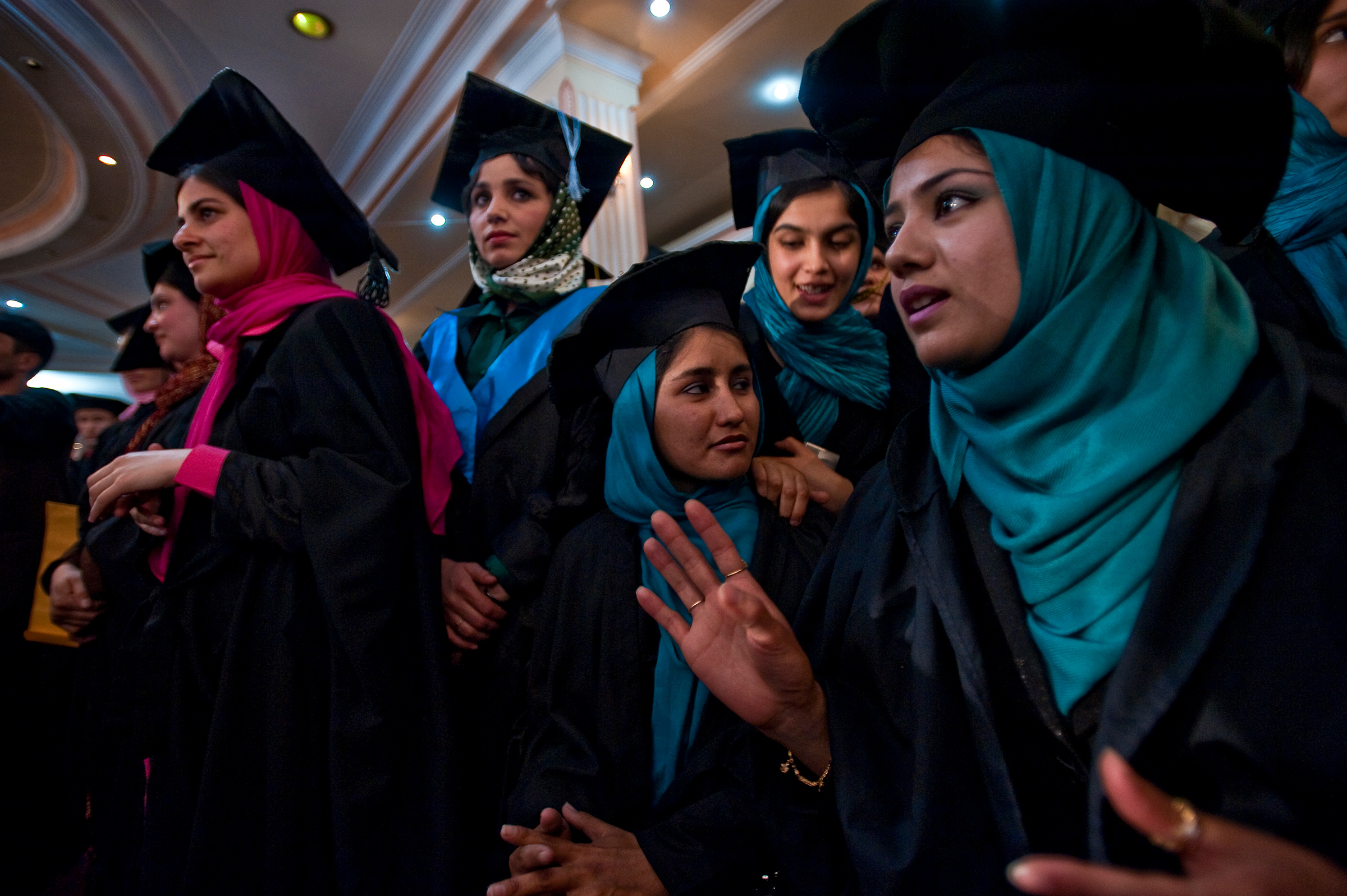 Wearing hijab under their mortarboards and seated in separate rows from their male peers, the women pictured are members of Kabul University's class of 2010 and graduates of the department of language and literature. This graduation was held under tight security at a hotel in Kabul because of an upsurge in terrorist attacks.