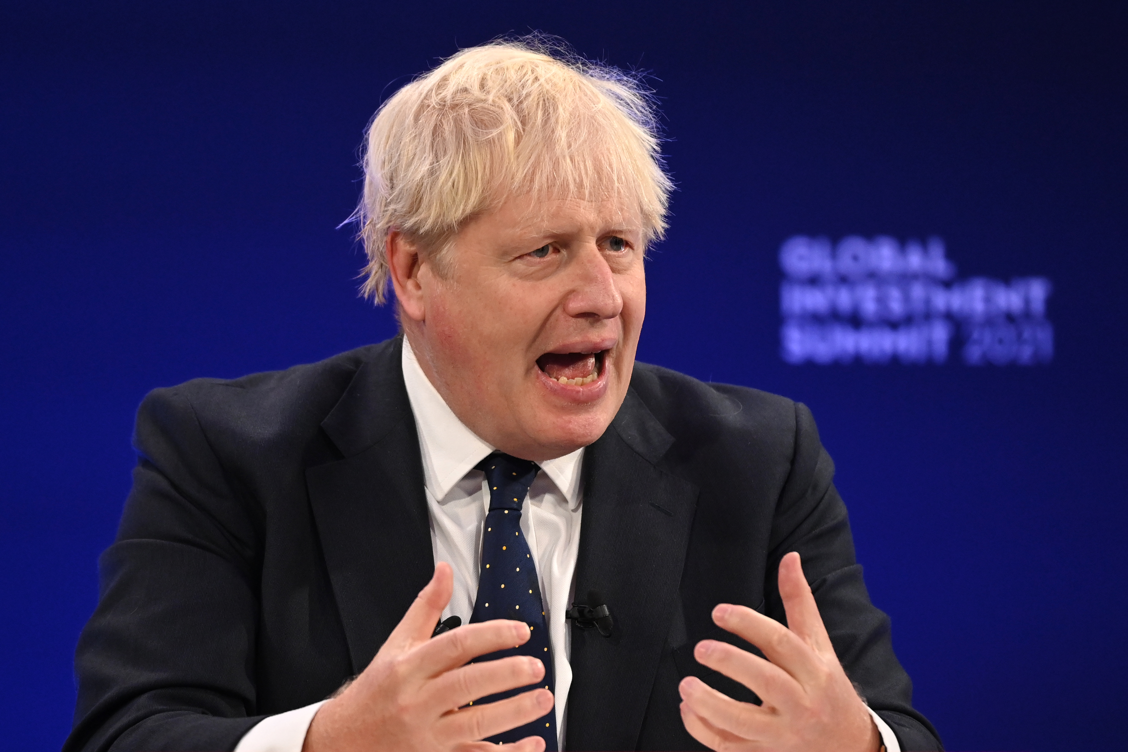 Prime Minister Boris Johnson speaks during the Global Investment Summit at the Science Museum on October 19, 2021 in London, England. (Leon Ne—WPA Pool / Getty Images)