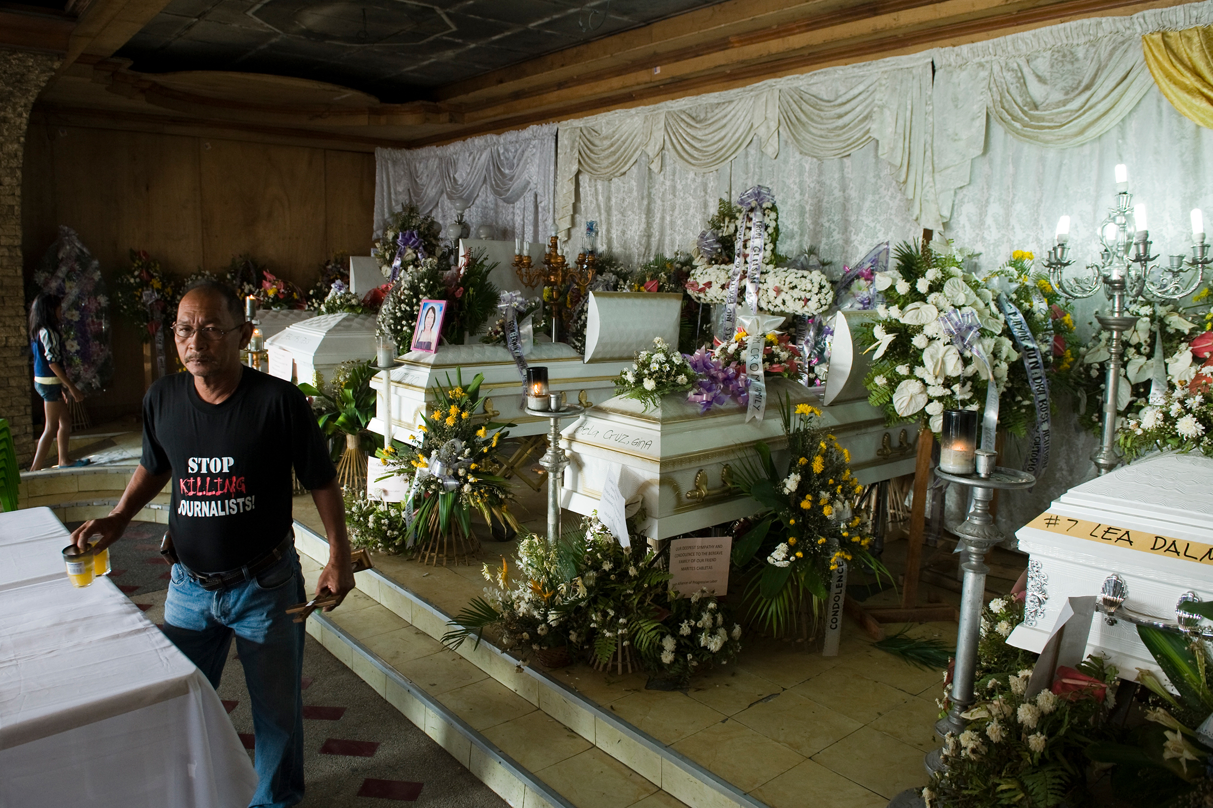 A wake for murdered journalists at the Collado Funeral Home in General Santos City, Mindanao, in 2009. (Gerhard Joren—LightRocket/Getty Images)