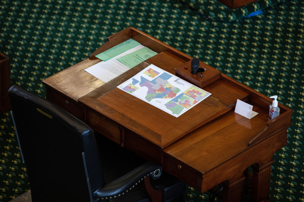 A map of state Senate districts is seen on a desk in the Texas Senate chamber at the State Capitol on Sept. 20, 2021 in Austin. (Tamir Kalifa—Getty Images)