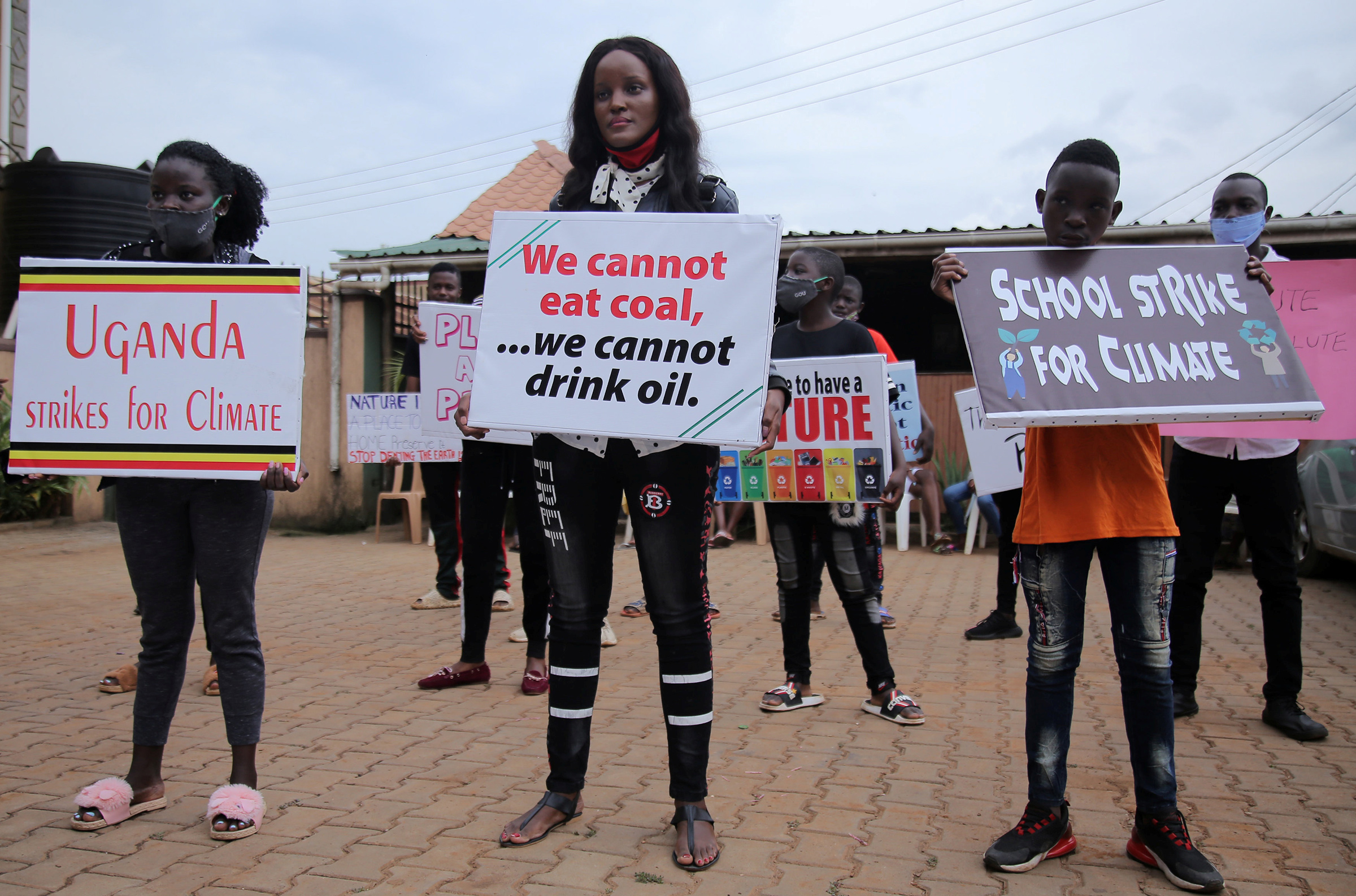 Nakate and other activists protest in Kampala, Uganda on Sept. 25, 2020. (Abubaker Lubowa—Reuters)