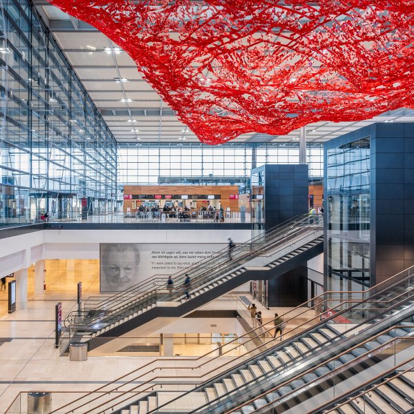 Terminal 1 at the Berlin Brandenburg Airport, where artist Pae White's “The Magic Carpet” hangs on the ceiling.