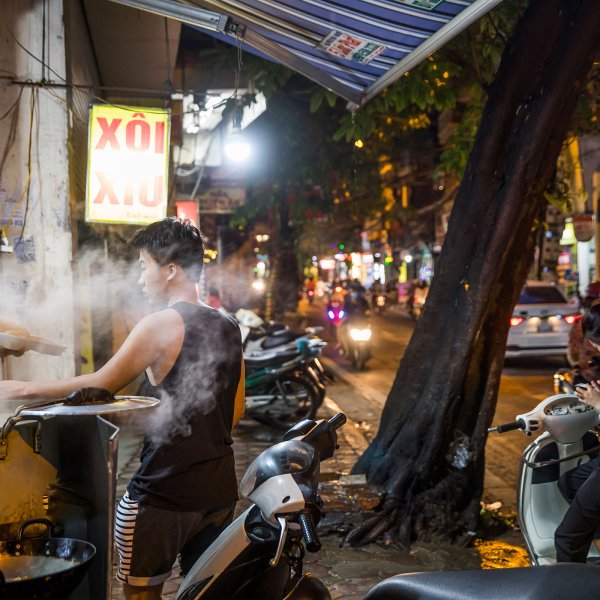 Street food scene in Hanoi.