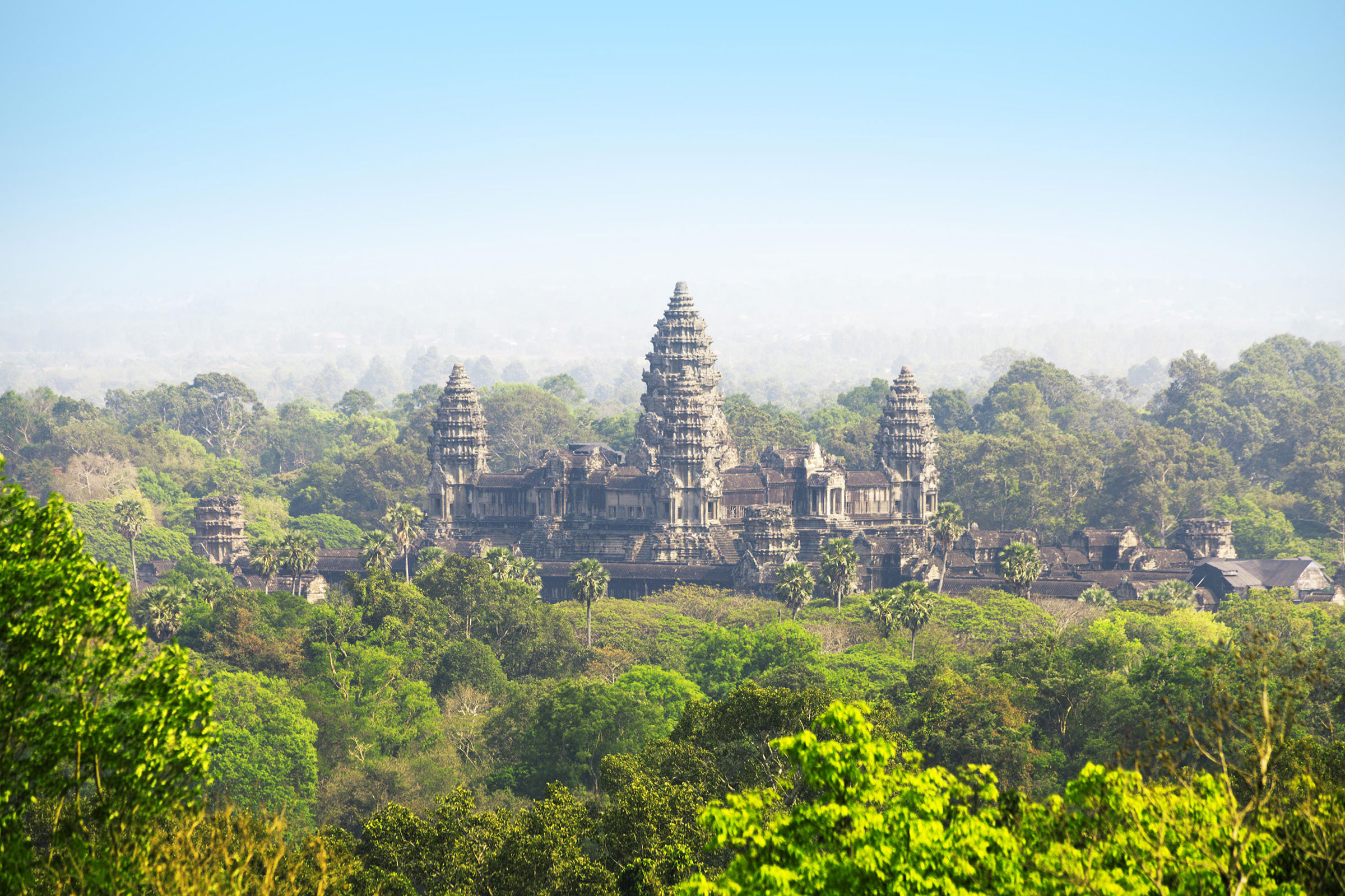 Angkor Wat, a common excursion for visitors to nearby Siem Reap, Cambodia. (Zoonar GmbH—Alamy)