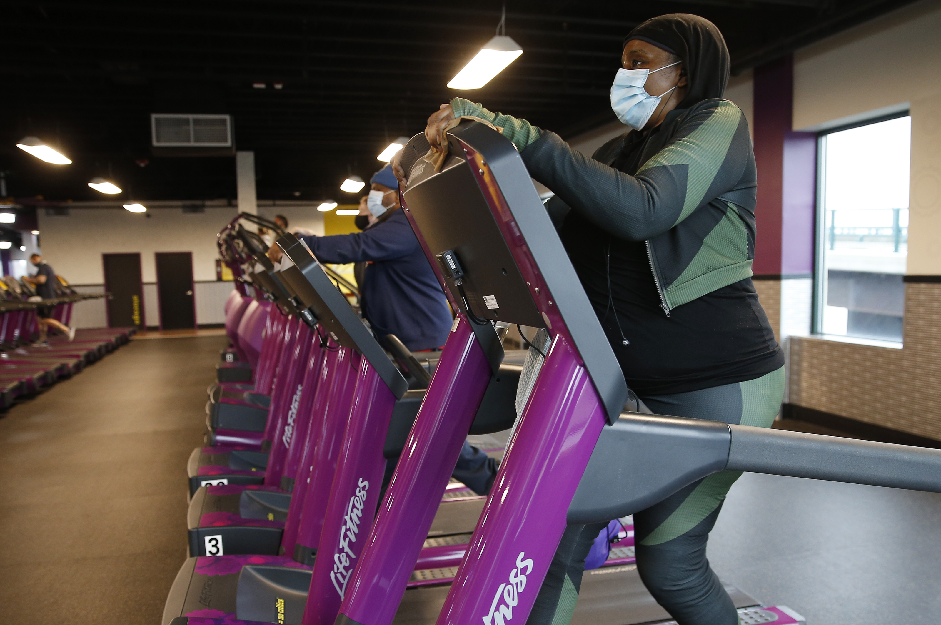 A person works out at Planet Fitness in Boston's Dorchester neighborhood on Feb. 1, 2021. (Photo by Jessica Rinaldi/The Boston Globe via Getty Images) (Boston Globe via Getty Images&mdash;2021 - The Boston Globe)
