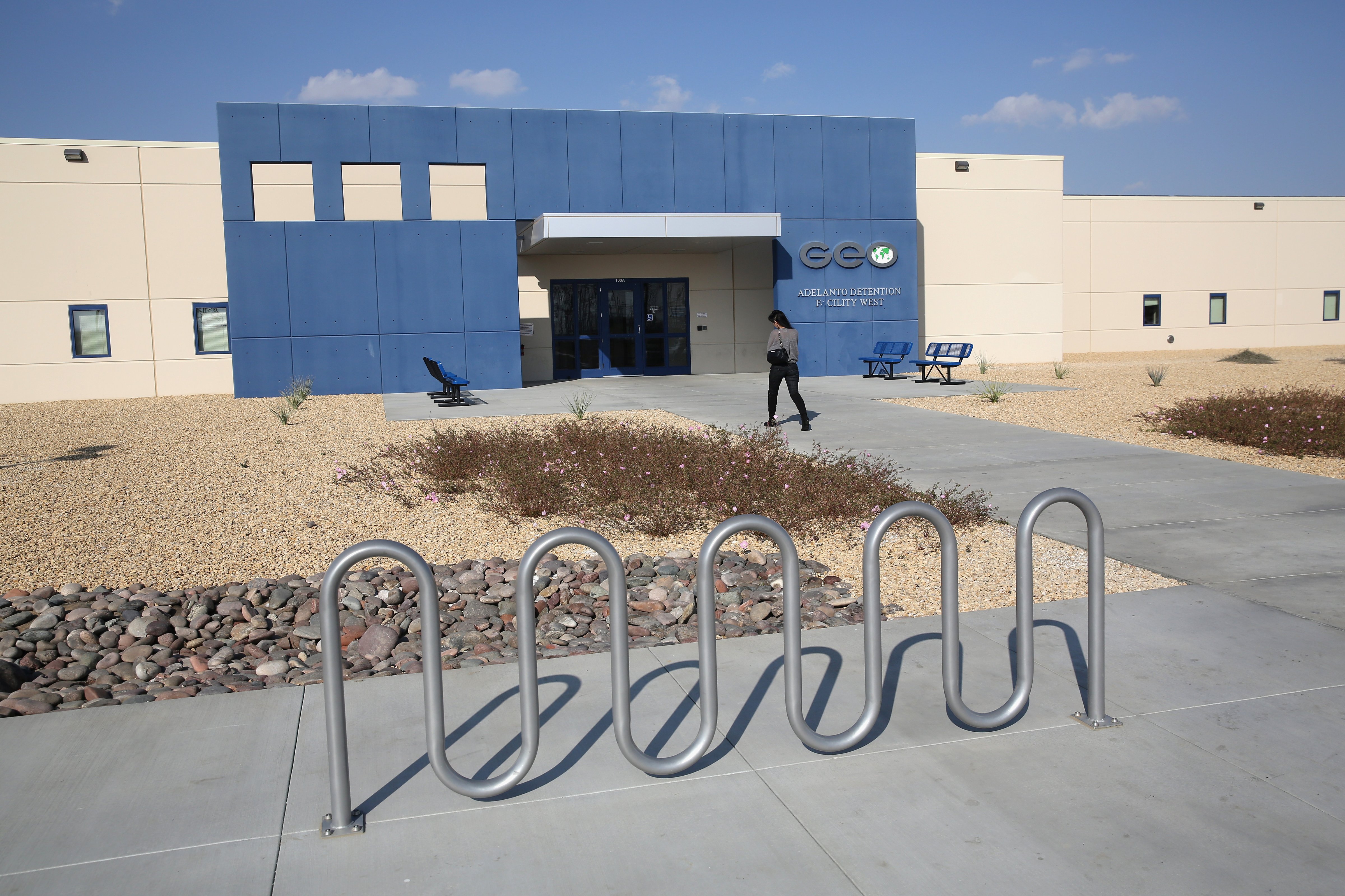 An immigrant who worked for $1/day while detained at Adelanto Detention Facility between 2012 and 2015 is now suing GEO Group, the private contractor who runs the facility (John Moore—Getty Images)