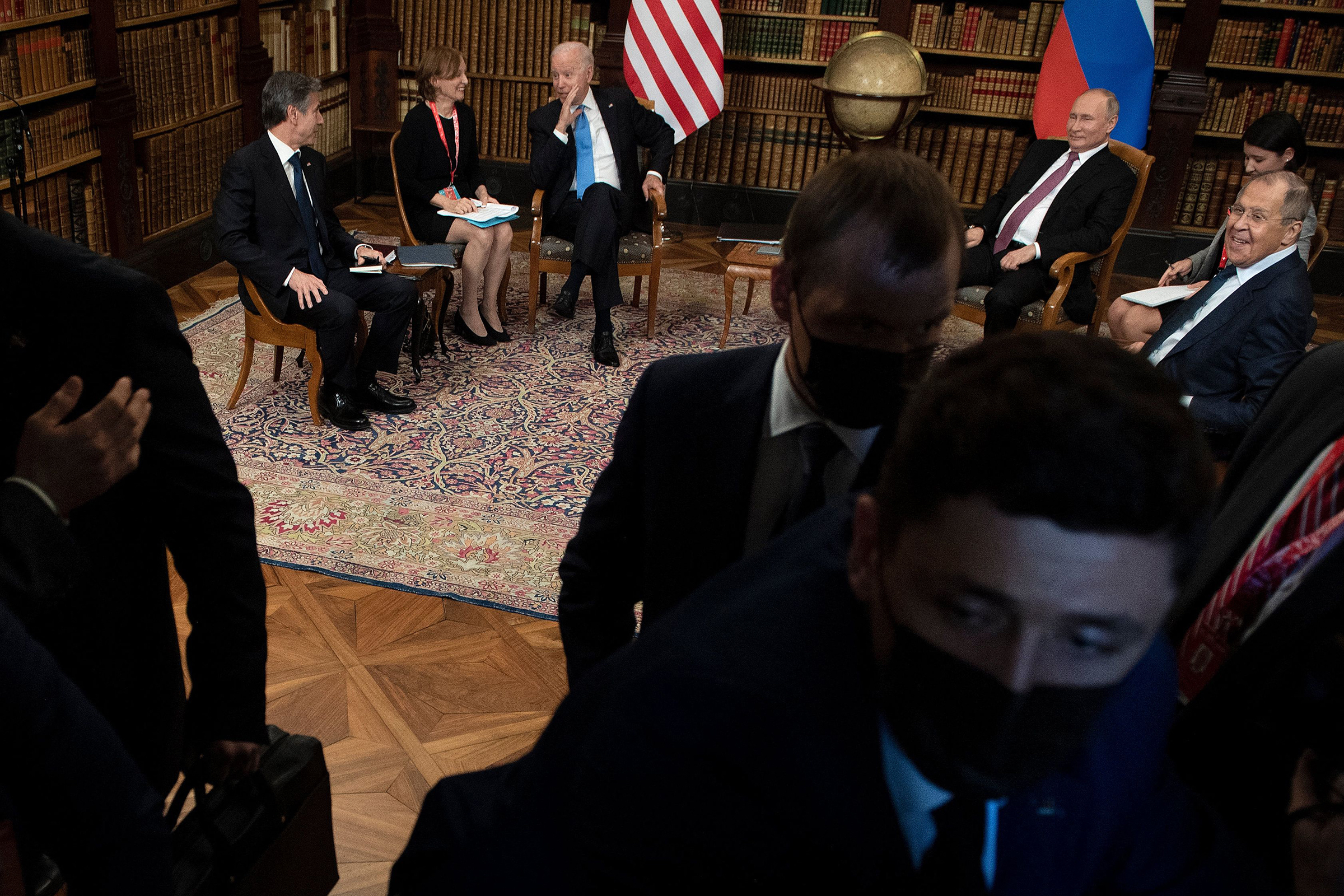Russian security personnel and others push the press out ahead of a June 16 meeting in Geneva between U.S. President Joe Biden and Russian President Vladimir Putin. Joining the leaders are U.S. Secretary of State Antony Blinken, left, and Russian Foreign Minister Sergey Lavrov, right.