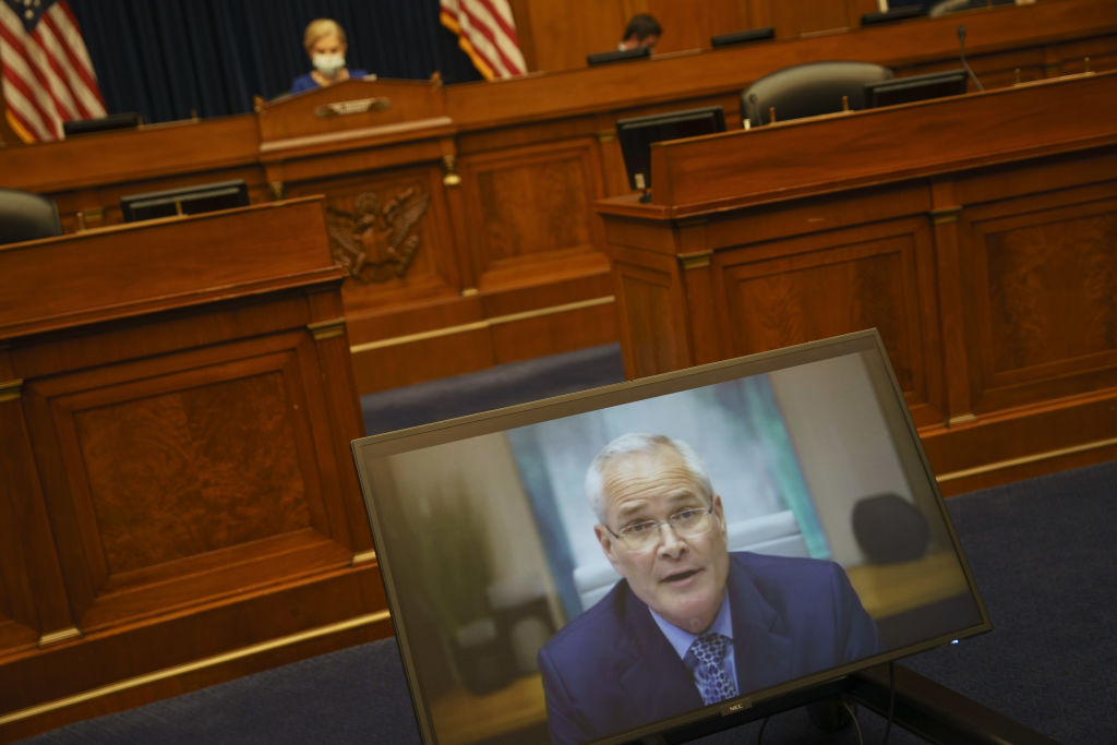 Darren Woods, chairman and chief executive officer of ExxonMobil, speaks via videoconference during a House Oversight and Reform Committee hearing in Washington, D.C., U.S., on Oct. 28, 2021. (Ting Shen—Bloomberg/Getty Images)