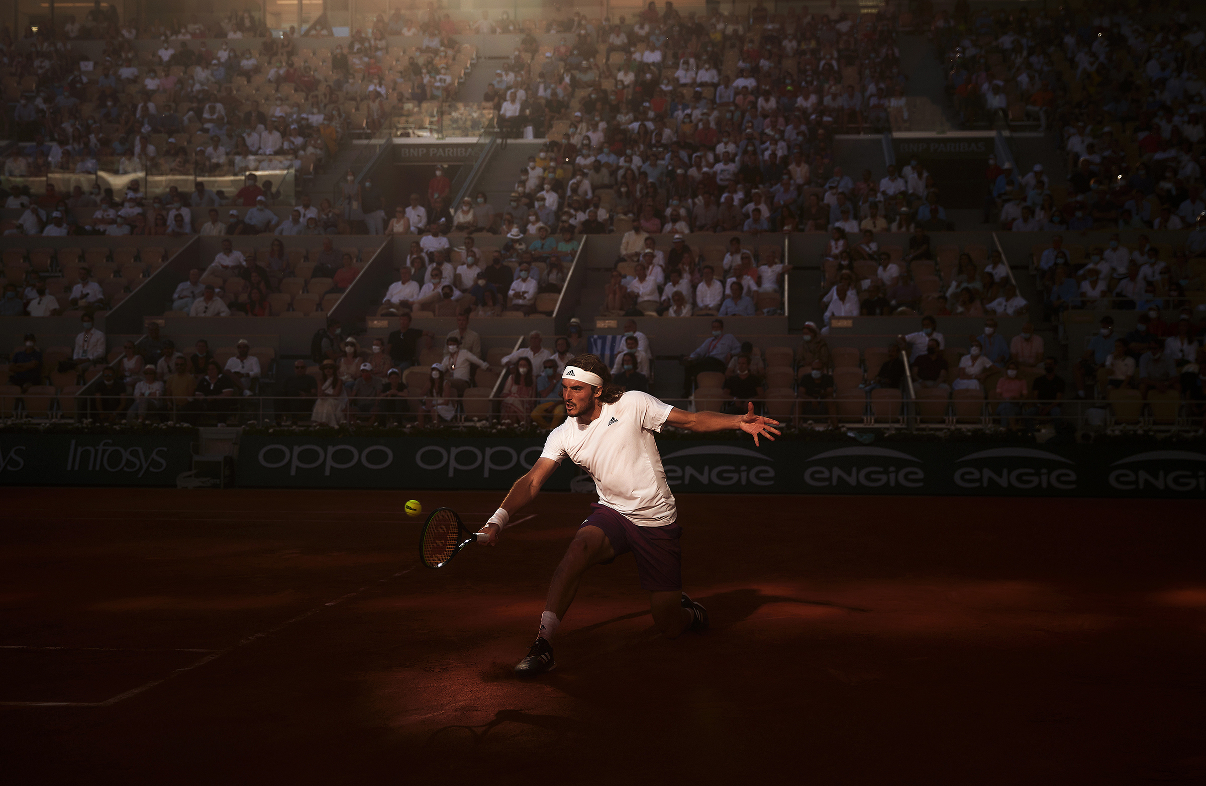 Stefanos Tsitsipas of Greece plays a backhand in his match against Novak Djokovic of Serbia during the Men's Singles Final match of the French Open in Paris on June 13. Djokovic won the final in five sets.