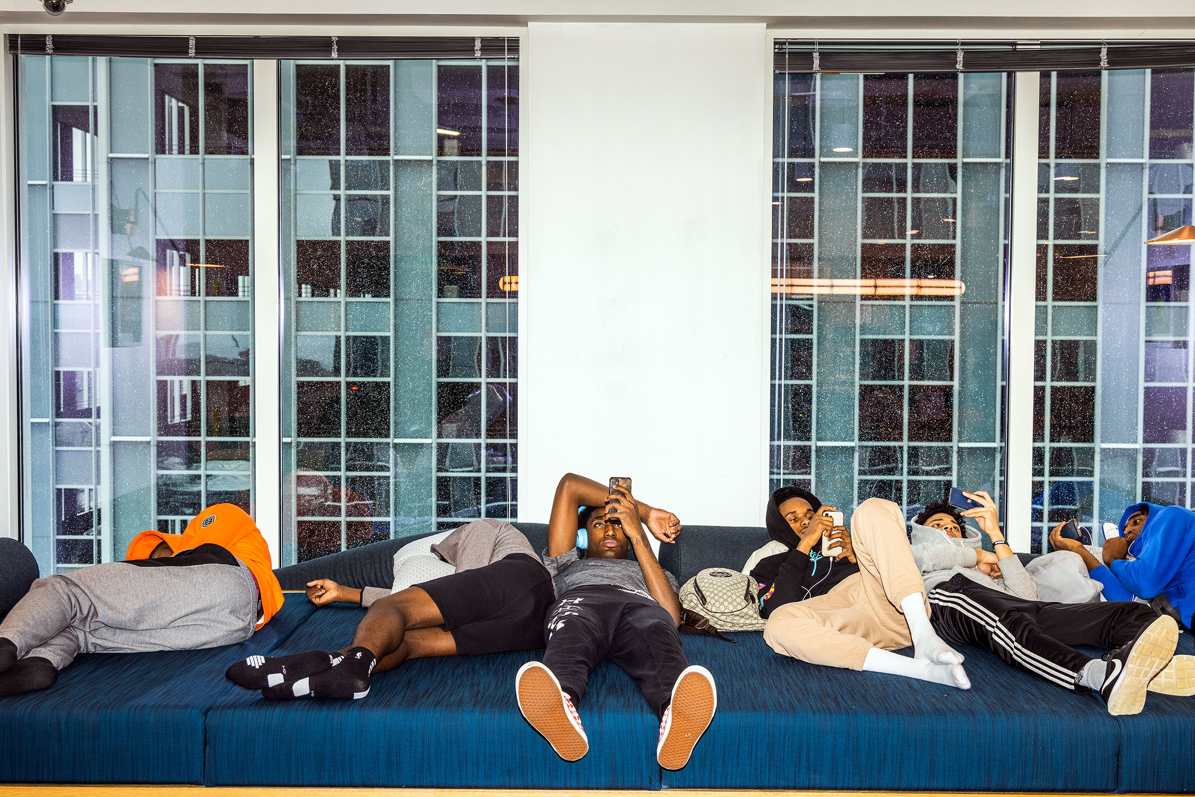 Overtime Elite players relax between classes at the WeWork space. (Andrew Hetherington for TIME)