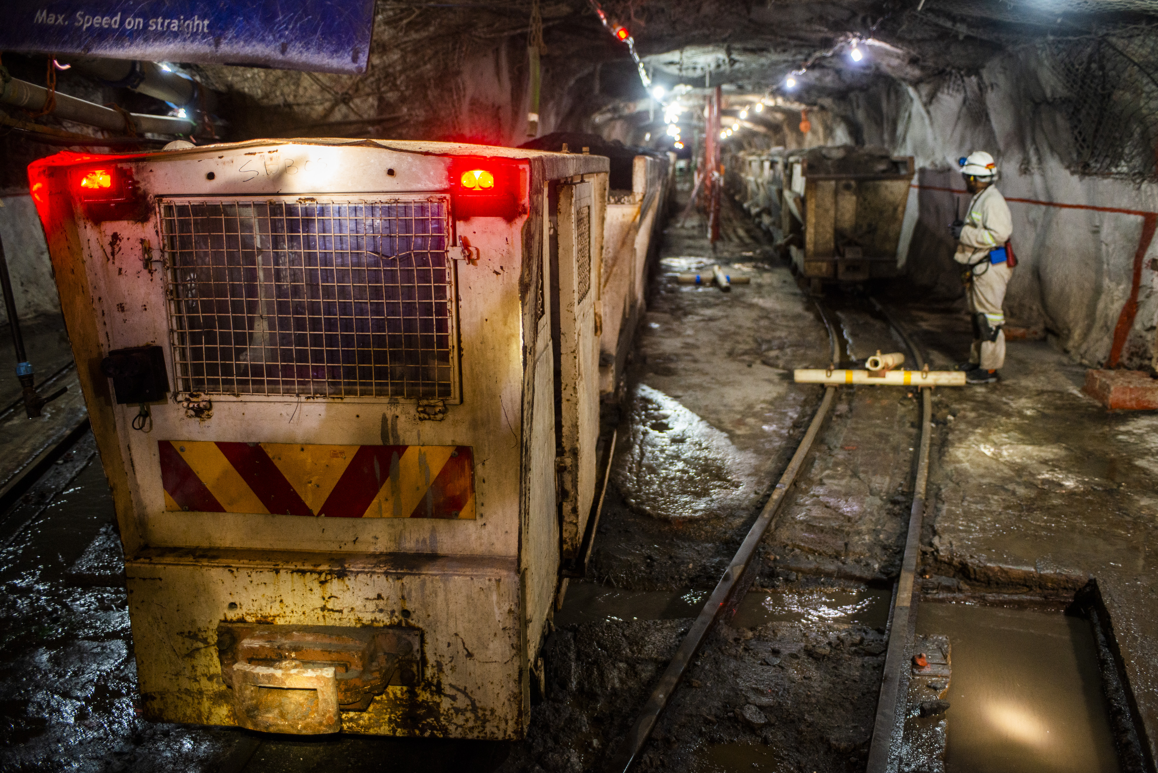 Freight wagons containing mined platinum rich rock stand on tracks in the mine shaft ready for transport to the surface during a media tour of the Sibanye-Stillwater Khuseleka platinum mine, operated by Sibanye Gold Ltd., outside Rustenburg, South Africa on Wednesday, Oct. 16 2019. (Waldo Swiegers/Bloomberg —Getty Images)