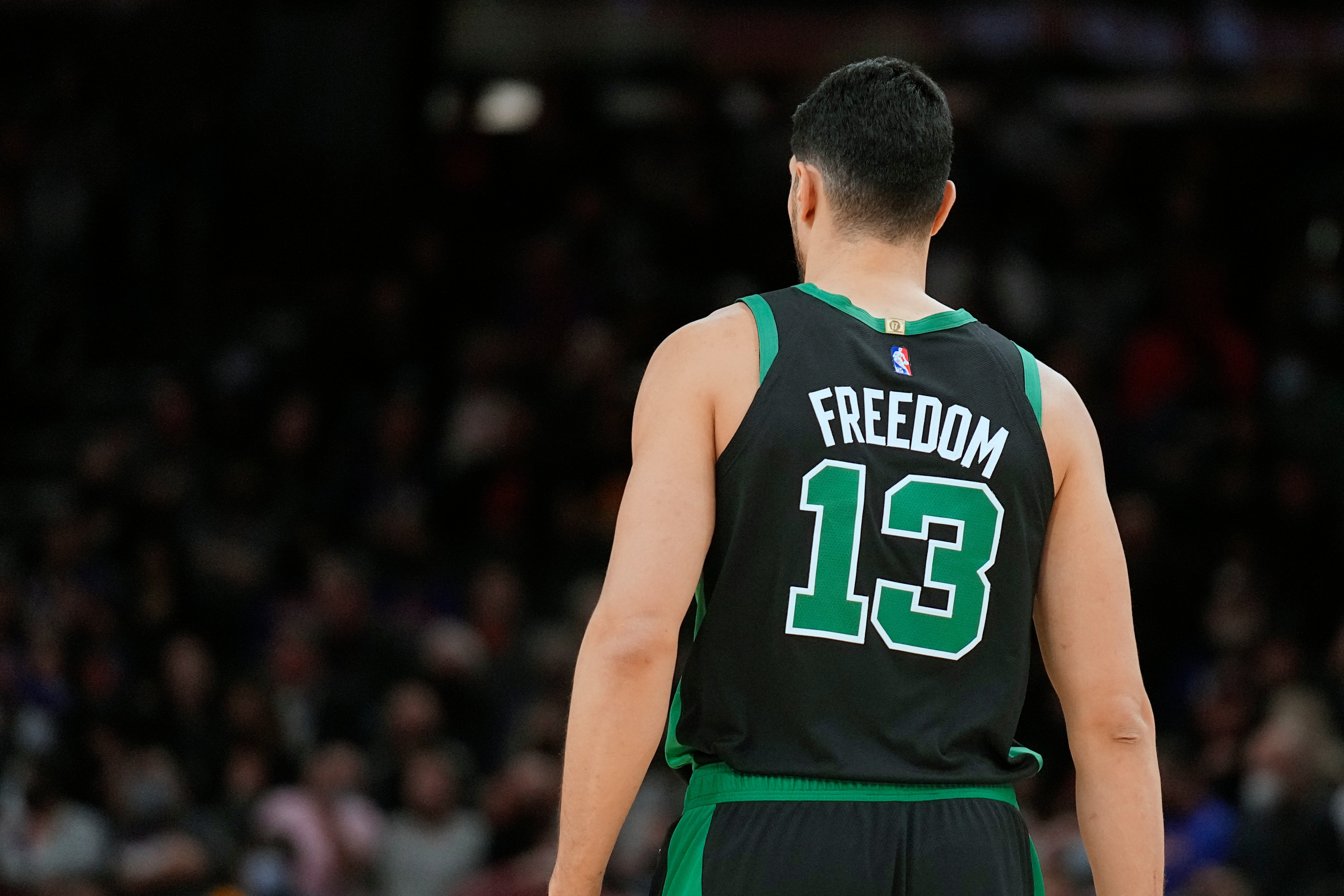Boston Celtics center Enes Freedom (13) during the first half of an NBA basketball game against the Phoenix Suns, Friday, Dec. 10, 2021, in Phoenix. (Rick Scuteri-AP Photo)