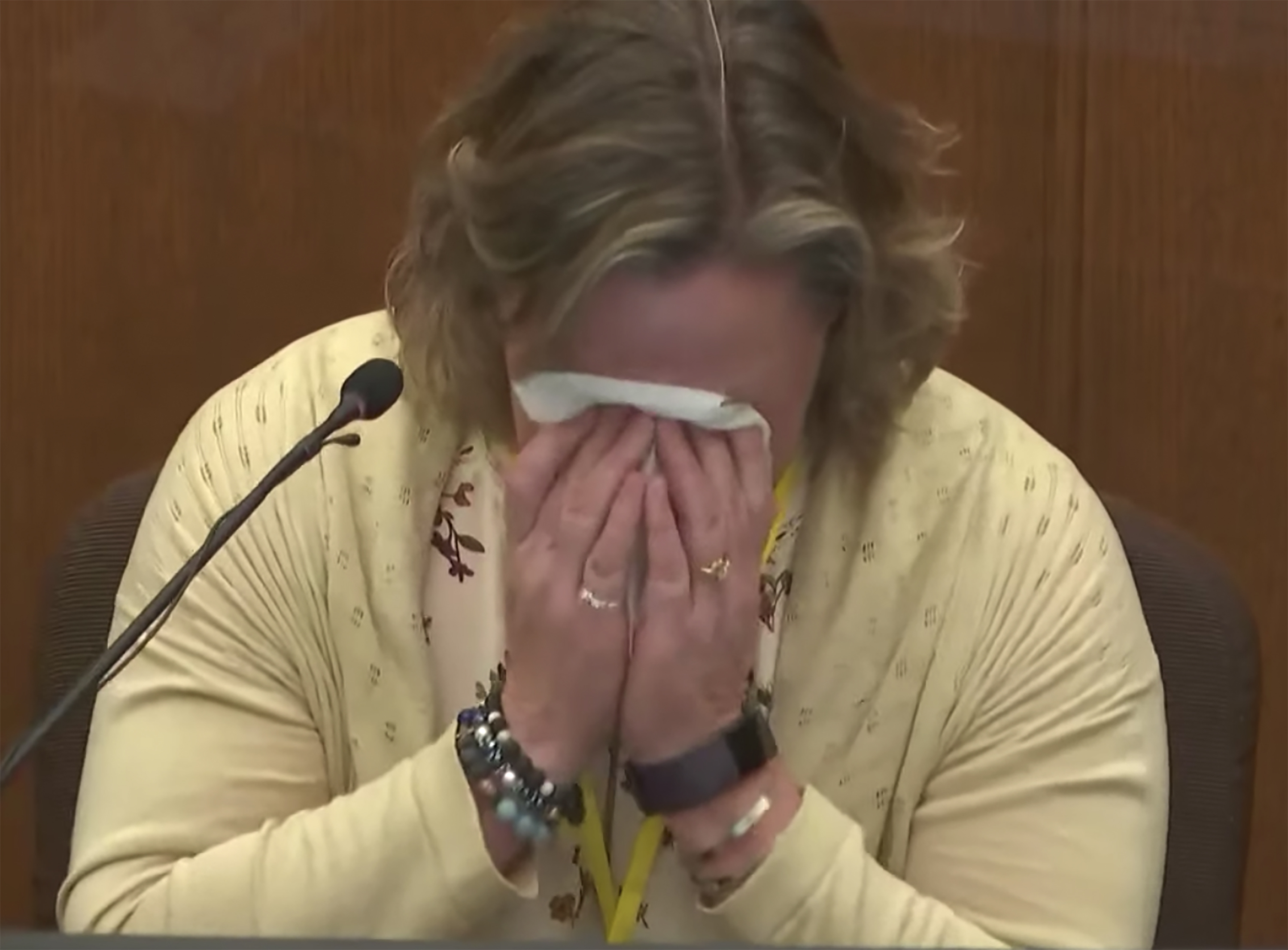 In this screen grab from video, former Brooklyn Center, Minn. police officer Kim Potter breaks down while describing for a jury the seconds in which Daunte Wright was shot dead during a traffic stop in April 2021. Potter, testifying Dec. 17 in her manslaughter trial in Minneapolis, says she accidentally grabbed her gun instead of her taser. (Court TV/AP/Pool)