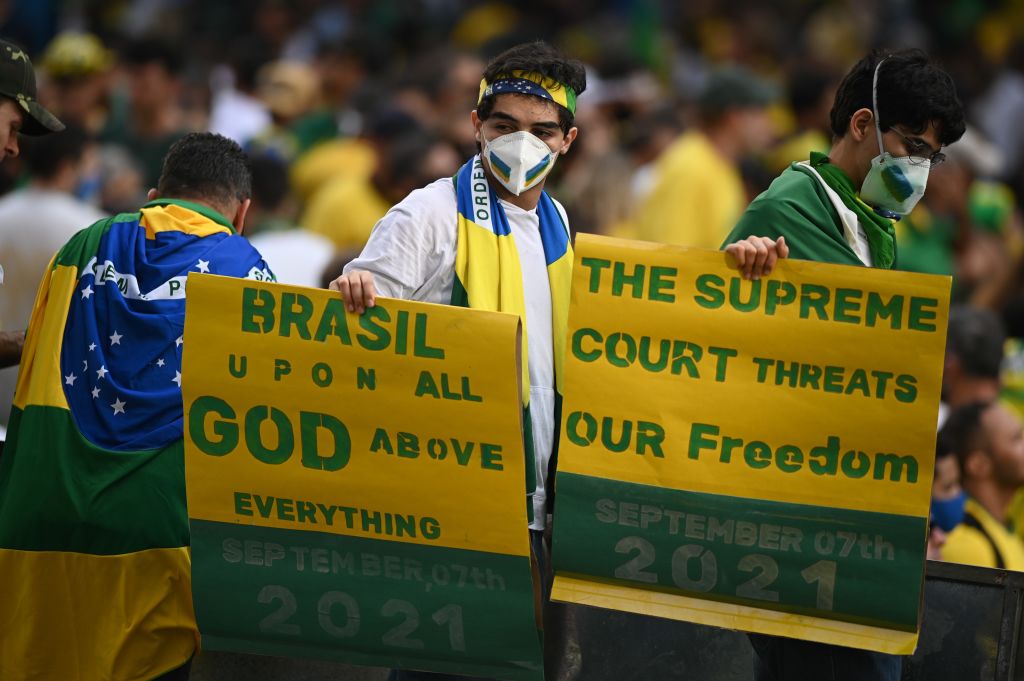 "The Supreme Court threatens our freedom," reads the placard of a supporter of President Bolsonaro's government during a rally in support of the leader on Independence Day on Sept. 7 2021, Brazil, São Paulo: (Andre Borges—dpa/picture alliance/Getty Images)