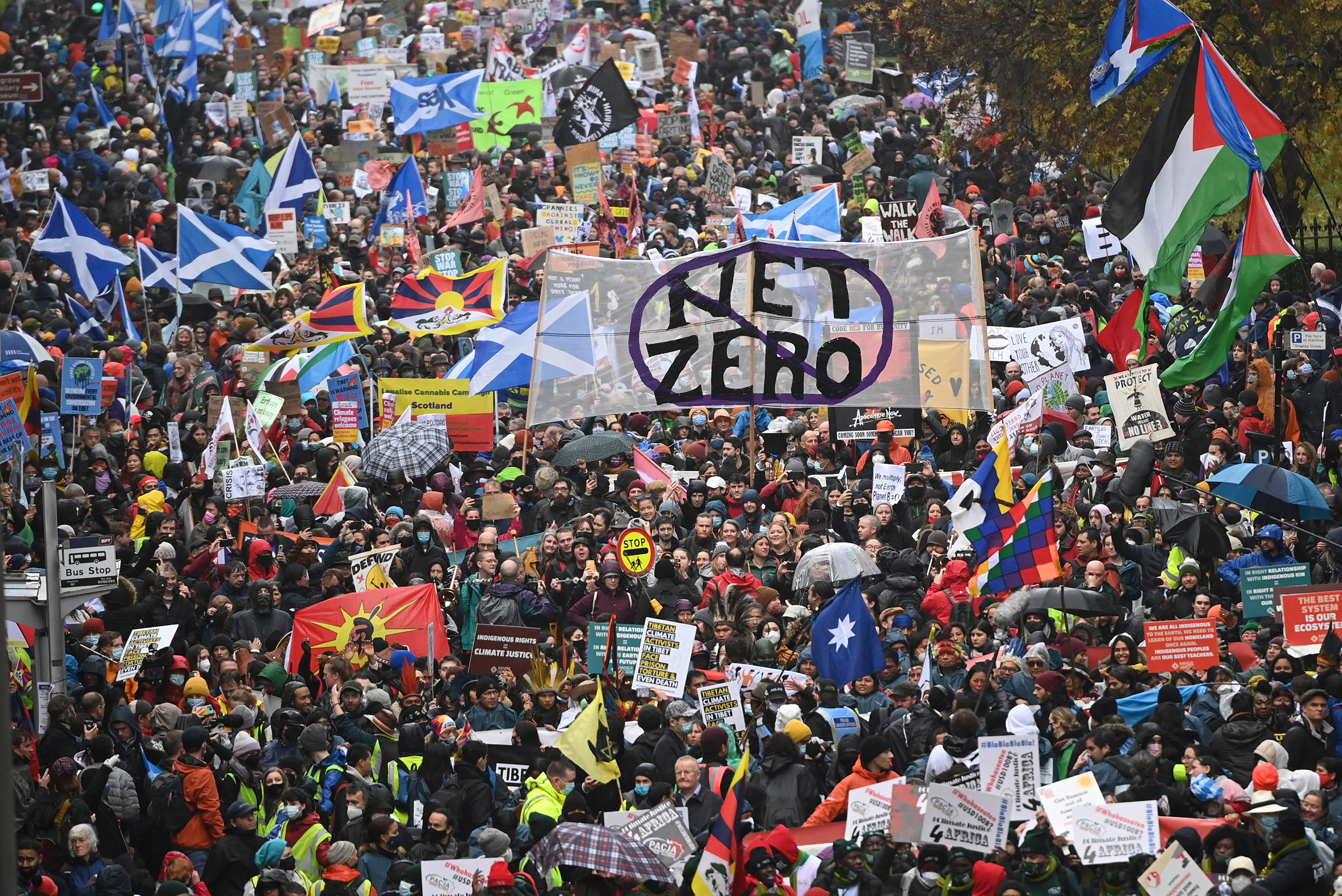 Climate protestors gather for the Global Day of Action for Climate Justice march in Glasgow, Scotland, on Nov. 6, 2021. (Jeff J. Mitchell—Getty Images)