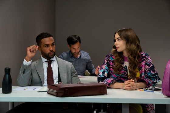 Emily in Paris. (L to R) Lucien Laviscount as Alfie, Lily Collins as Emily in episode 204 of Emily in Paris. Cr. StÃ©phanie Branchu/Netflix Â© 2021