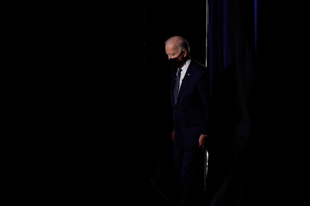 U.S. President Joe Biden walks into the South Court Auditorium studio before delivering opening remarks for the virtual Summit for Democracy in Washington, D.C., on December 09, 2021. (Chip Somodevilla—Getty Images)