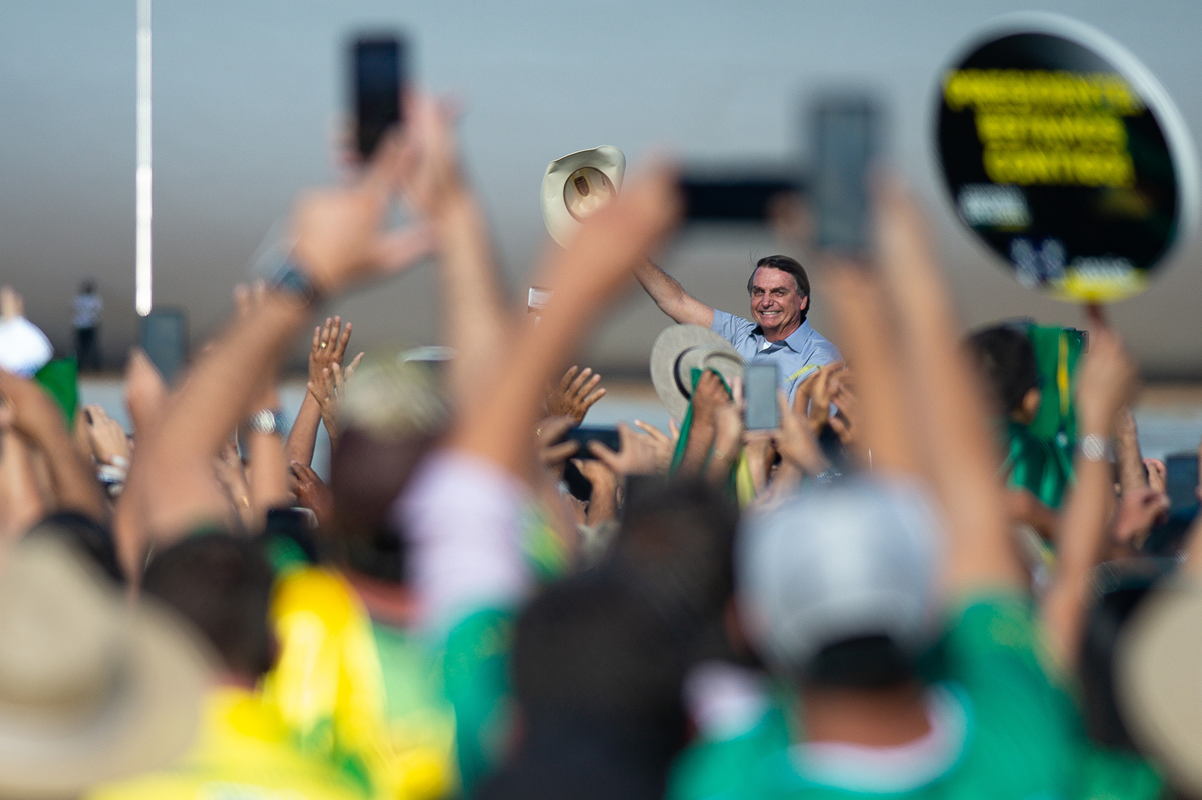 President of Brazil Jair Bolsonaro arrives riding on a horse for a protest organized to show support to his government at Esplanada dos Ministérios on May 15, 2021 in Brasilia, Brazil. (Andressa Anholete/Getty Images)