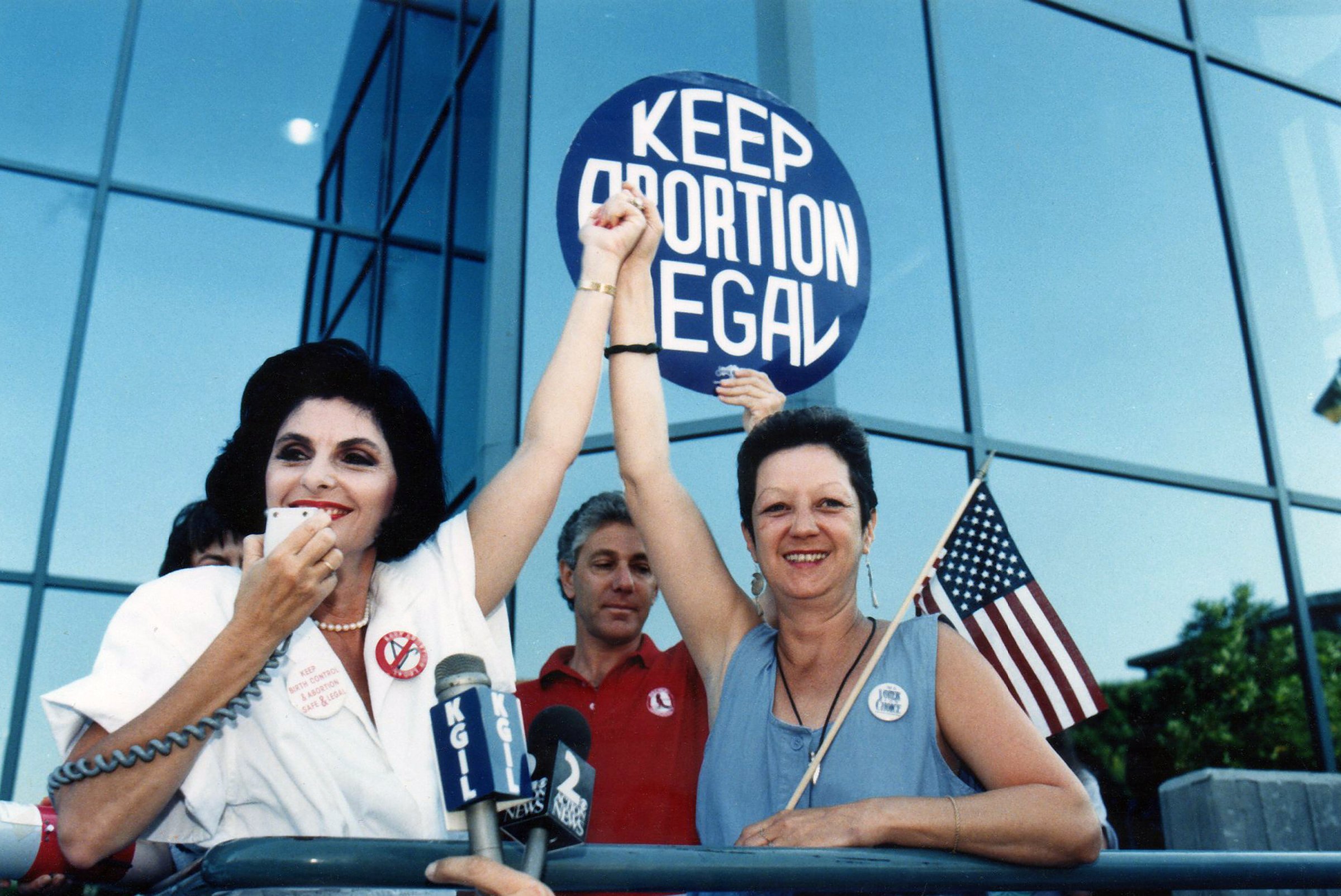 Attorney Gloria Allred and Norma McCorvey (R), the 'Jane Roe' plaintiff from the landmark court case Roe vs. Wade during an abortion rights rally, July 4, 1989 in Burbank, California.