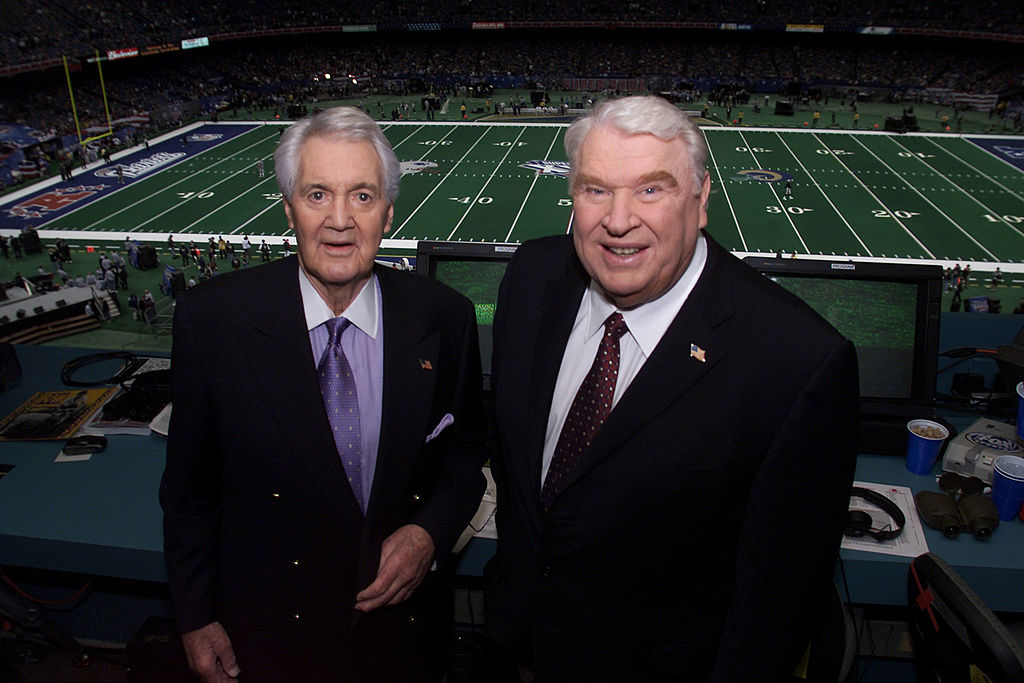 Pat Summerall and John Madden (right) in the broadcast booth together for the last time at Super Bowl XXXVI at the Louisiana Superdome in New Orleans, La., on Feb. 3, 2002. (Frank Micelotta–ImageDirect/Getty Images)
