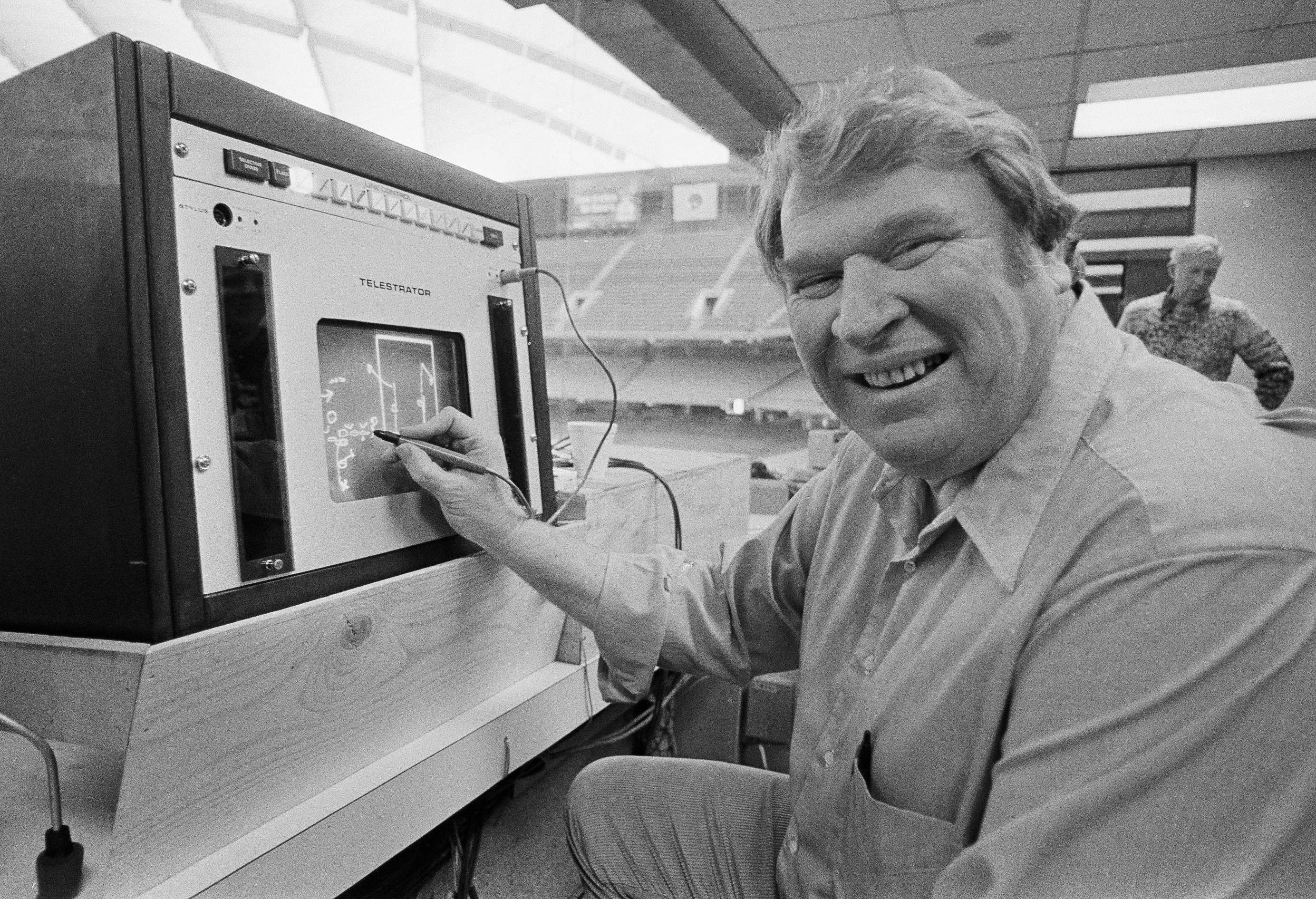 John Madden practices the electronic charting device Telestrator on Jan. 21, 1982, in Pontiac, Mich., for an upcoming NFL Super Bowl broadcast on CBS. Madden, the Hall of Fame coach turned broadcaster whose exuberant calls combined with simple explanations provided a weekly soundtrack to NFL games for three decades, died Tuesday morning, Dec. 28, 2021, the league said. He was 85. (AP)