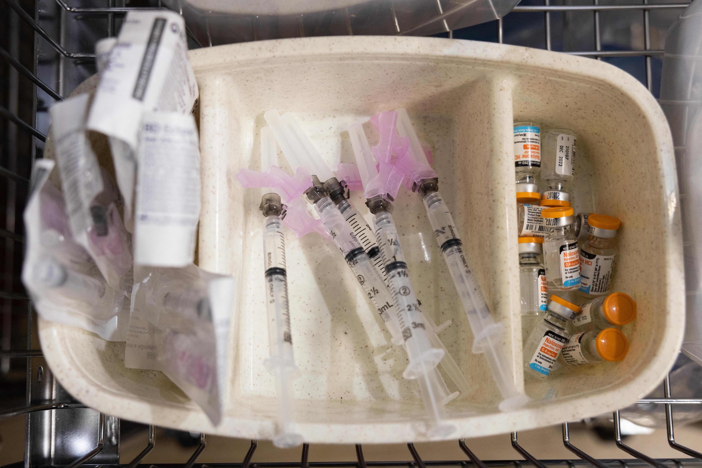 In this Nov. 30, 2021 photo, syringes and vials of Naloxone are shown during the media tour of the supervised drug injection site OnPoint, in New York.
