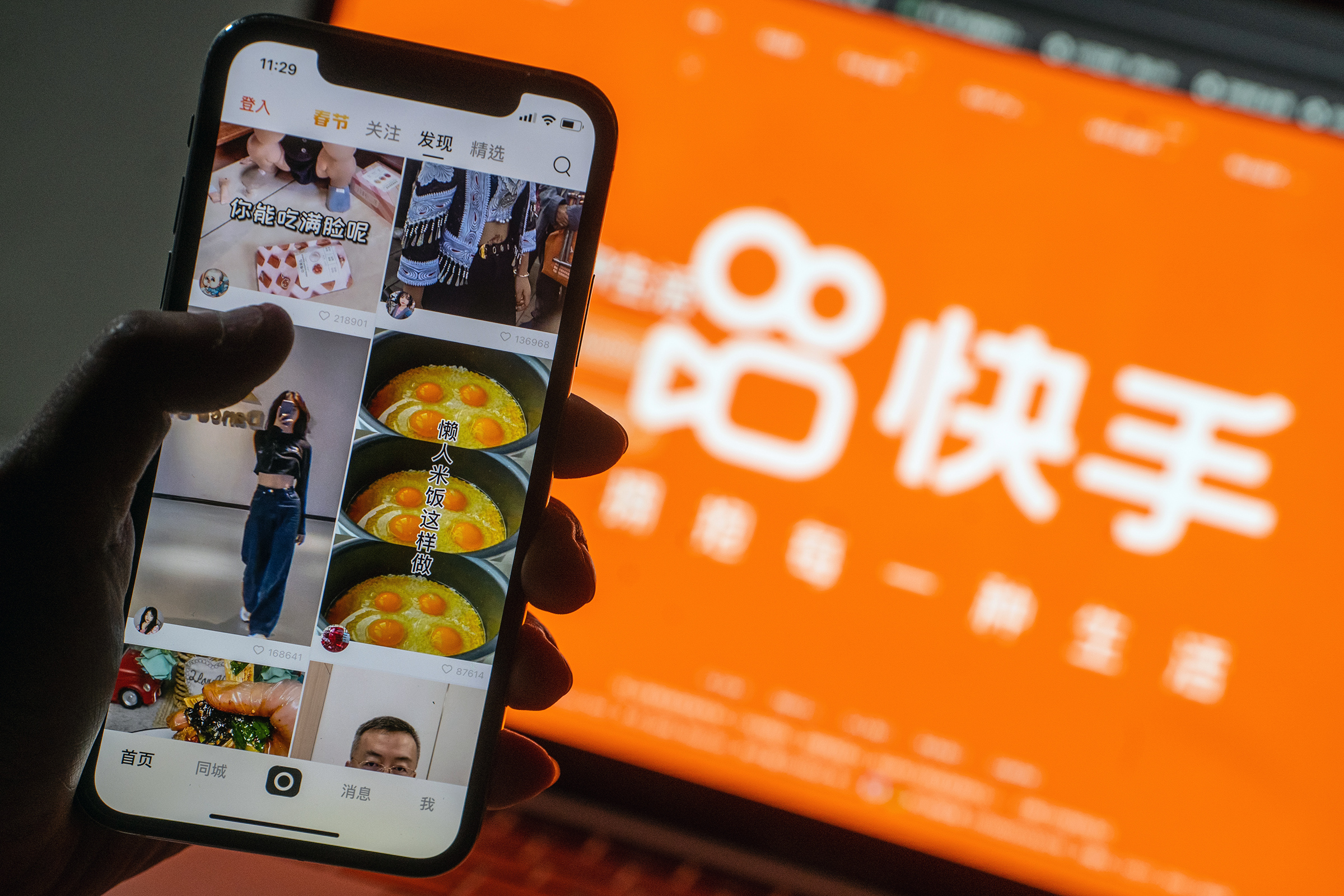 The Kuaishou Technology app on a smartphone arranged in Hong Kong, China, on Tuesday, Feb. 2, 2021. (Roy Liu—Bloomberg/Getty Images)