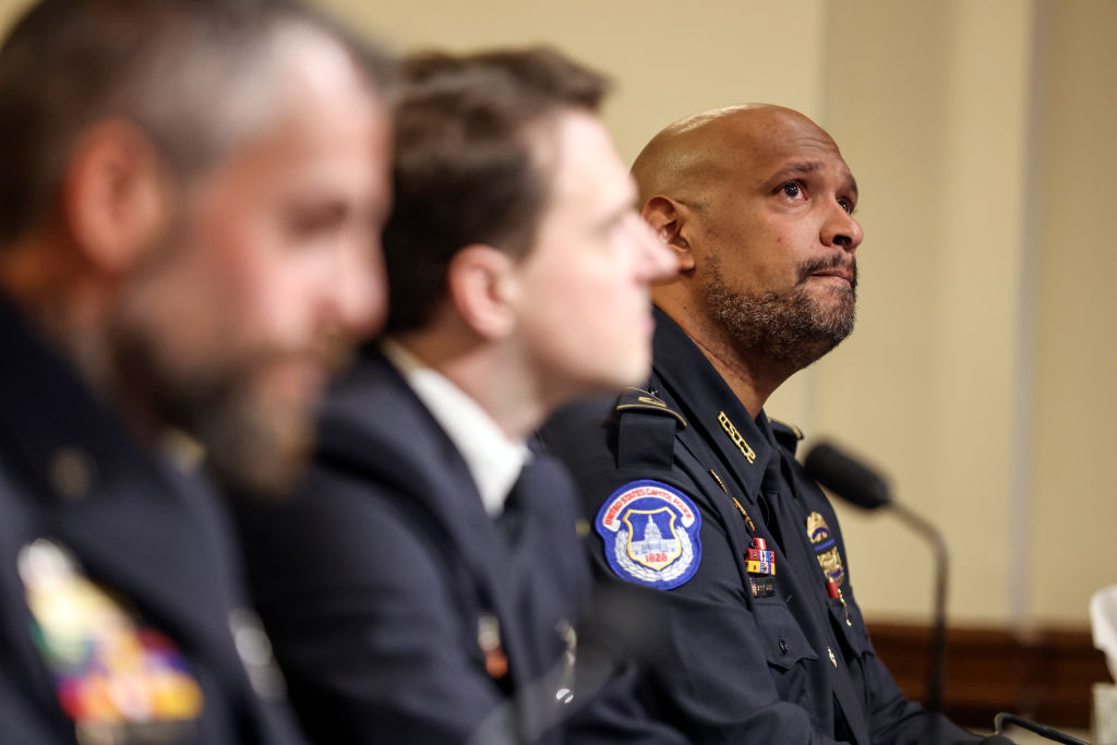 U.S. Capitol Police officer Harry Dunn becomes emotional as he testifies before the House Select Committee investigating the January 6 attack on the U.S. Capitol on July 27, 2021 at the Cannon House Office Building in Washington, D.C. (Oliver Contreras—Pool/Getty Images)