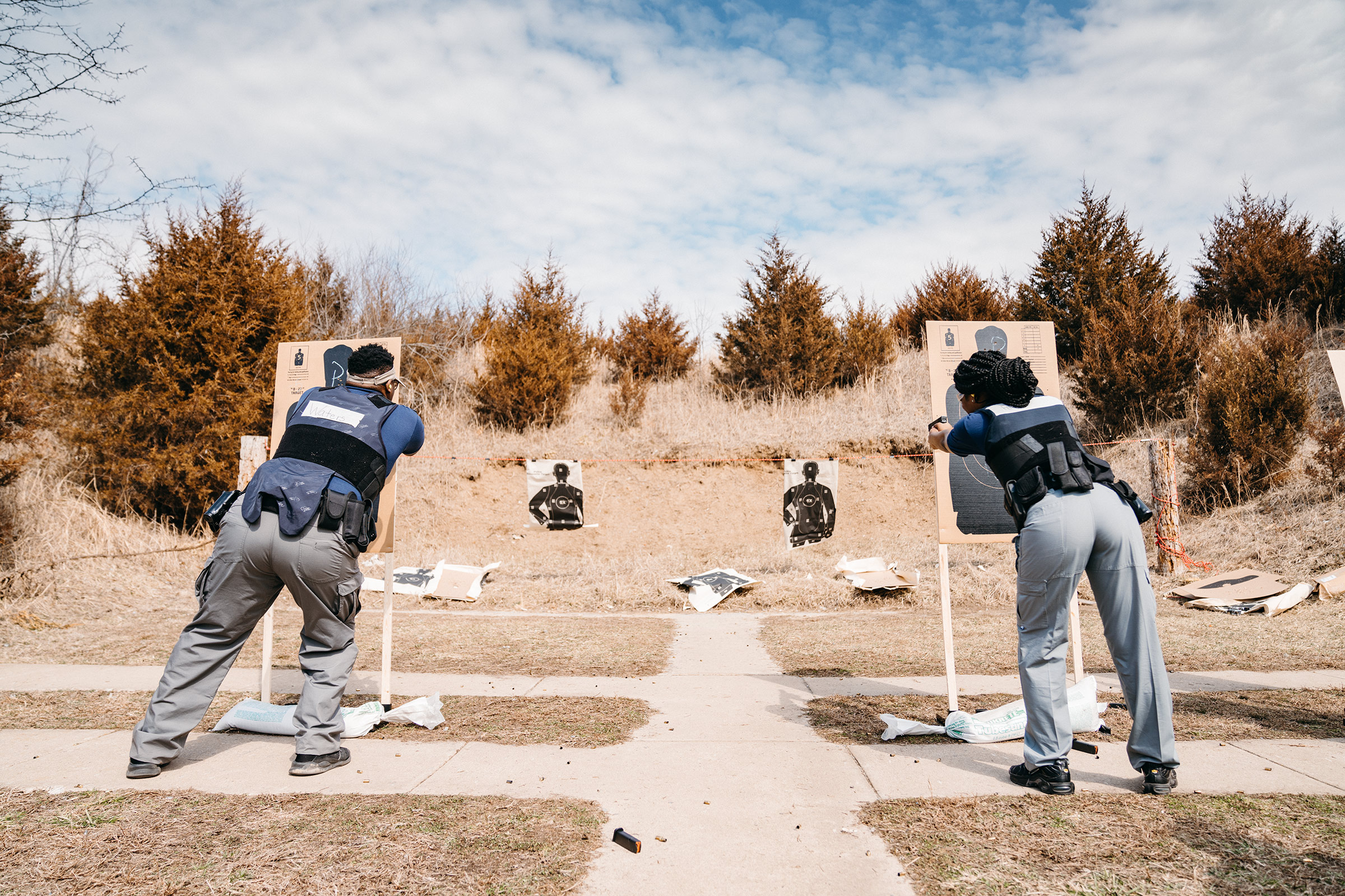 Two students during firearms <a href="https://time.com/5952208/hbcu-black-police-academy/">training</a> at a shooting range in Missouri on March 6. (Joe Martinez for TIME)