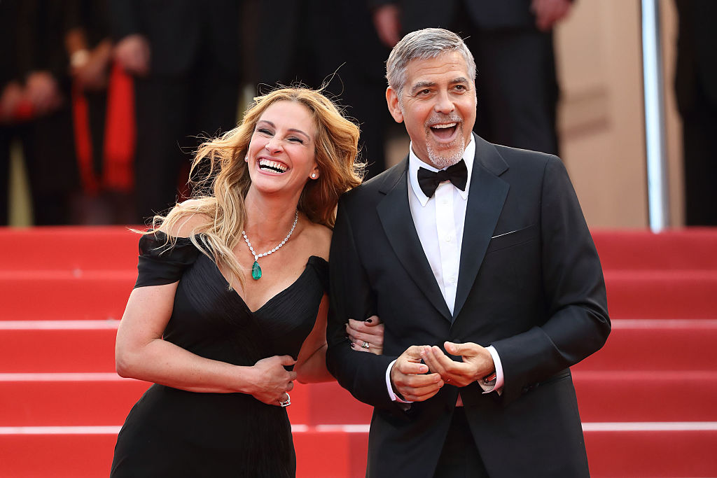 Julia Roberts and George Clooney attend the 'Money Monster' premiere during the 69th annual Cannes Film Festival at the Palais des Festivals on May 12, 2016 in Cannes, France. (Mike Marsland—WireImage)
