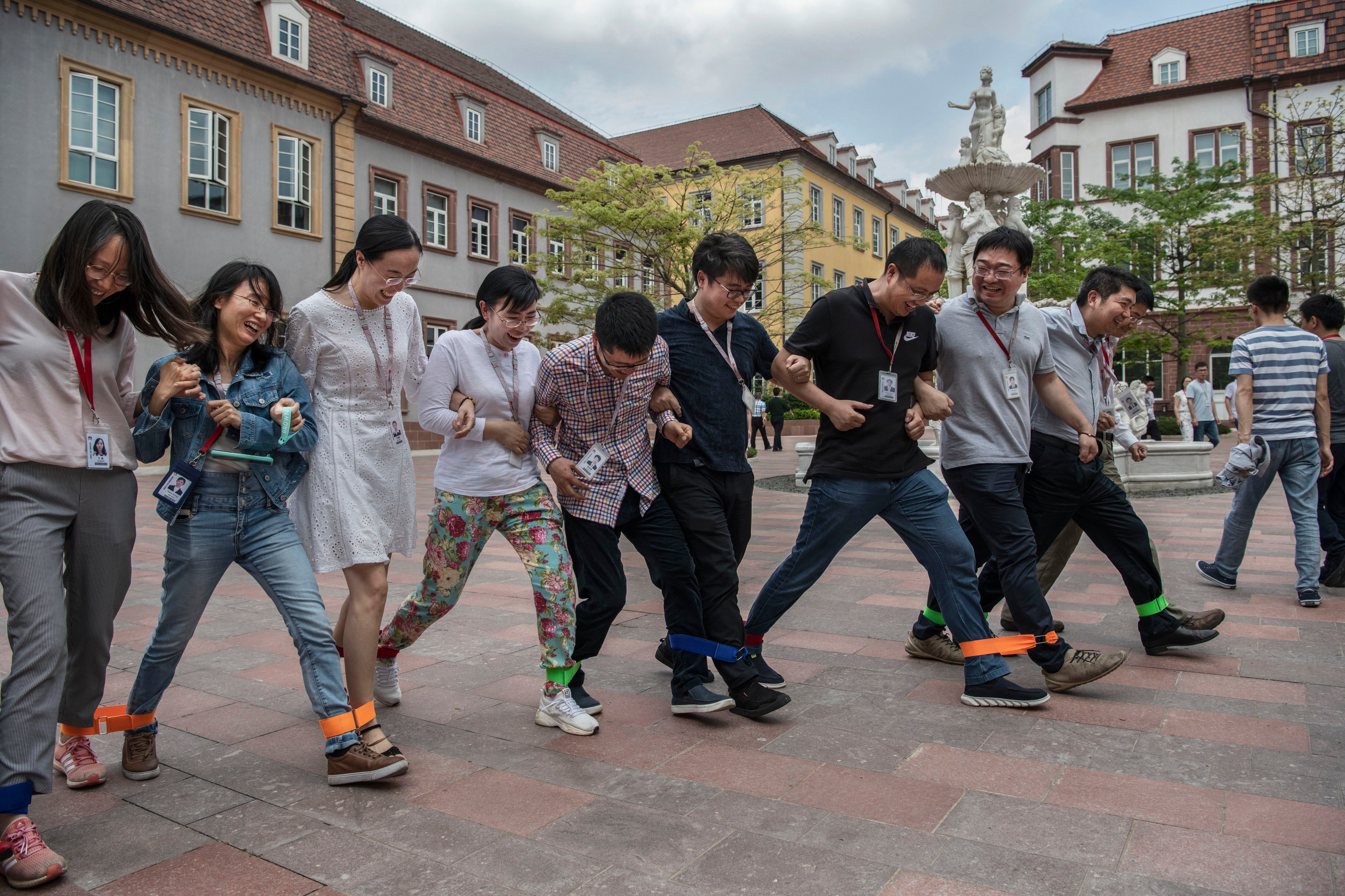 A Huawei team-building exercise before the pandemic. (Kevin Frayer/Getty Images)