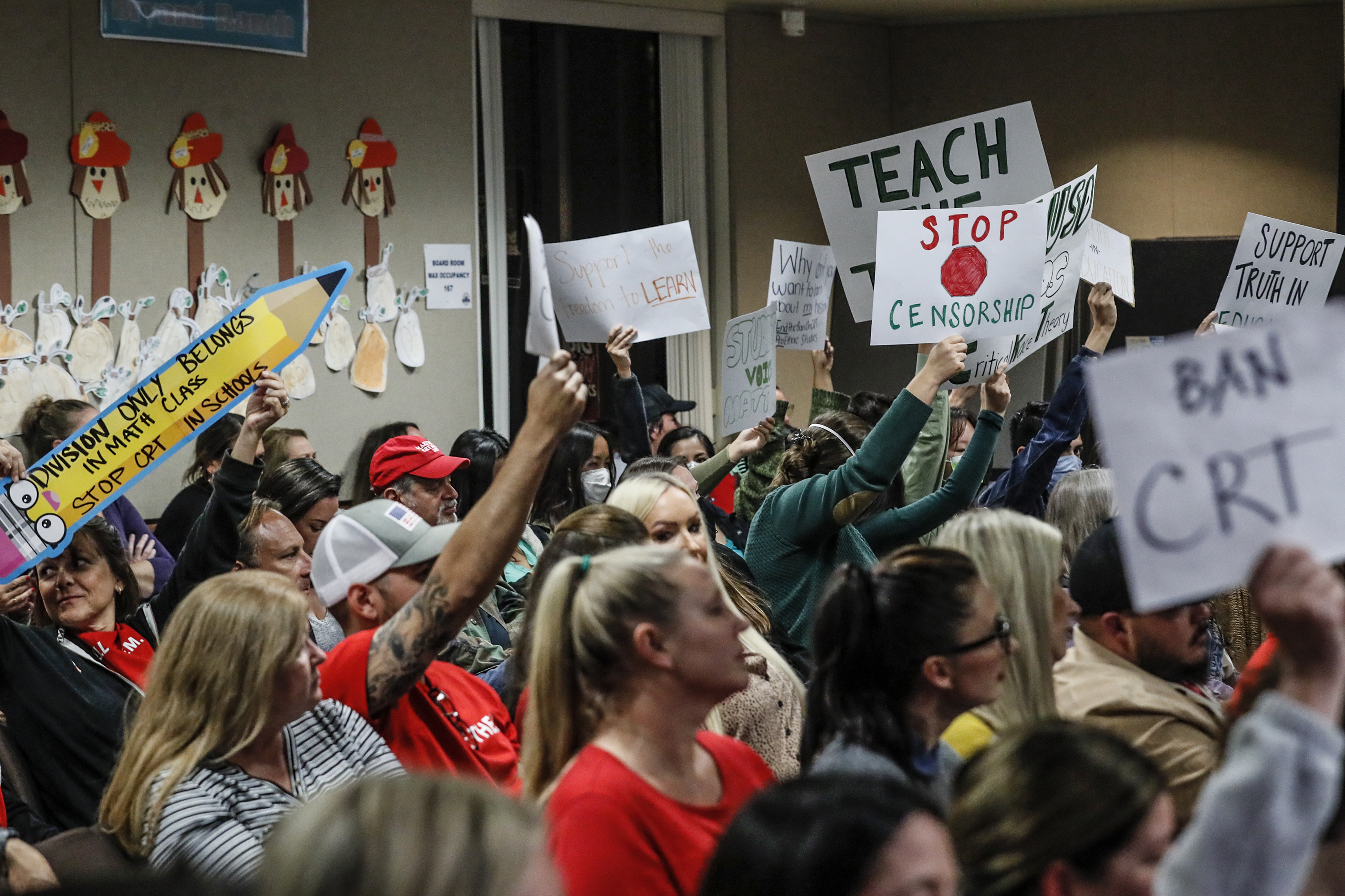 Supporters and opponents of teaching Critical Race Theory square off during a meeting of the Placentia-Yorba Linda, Calif., school district board on Nov. 16, 2021. (Robert Gauthier—Los Angeles Times/Getty Images)
