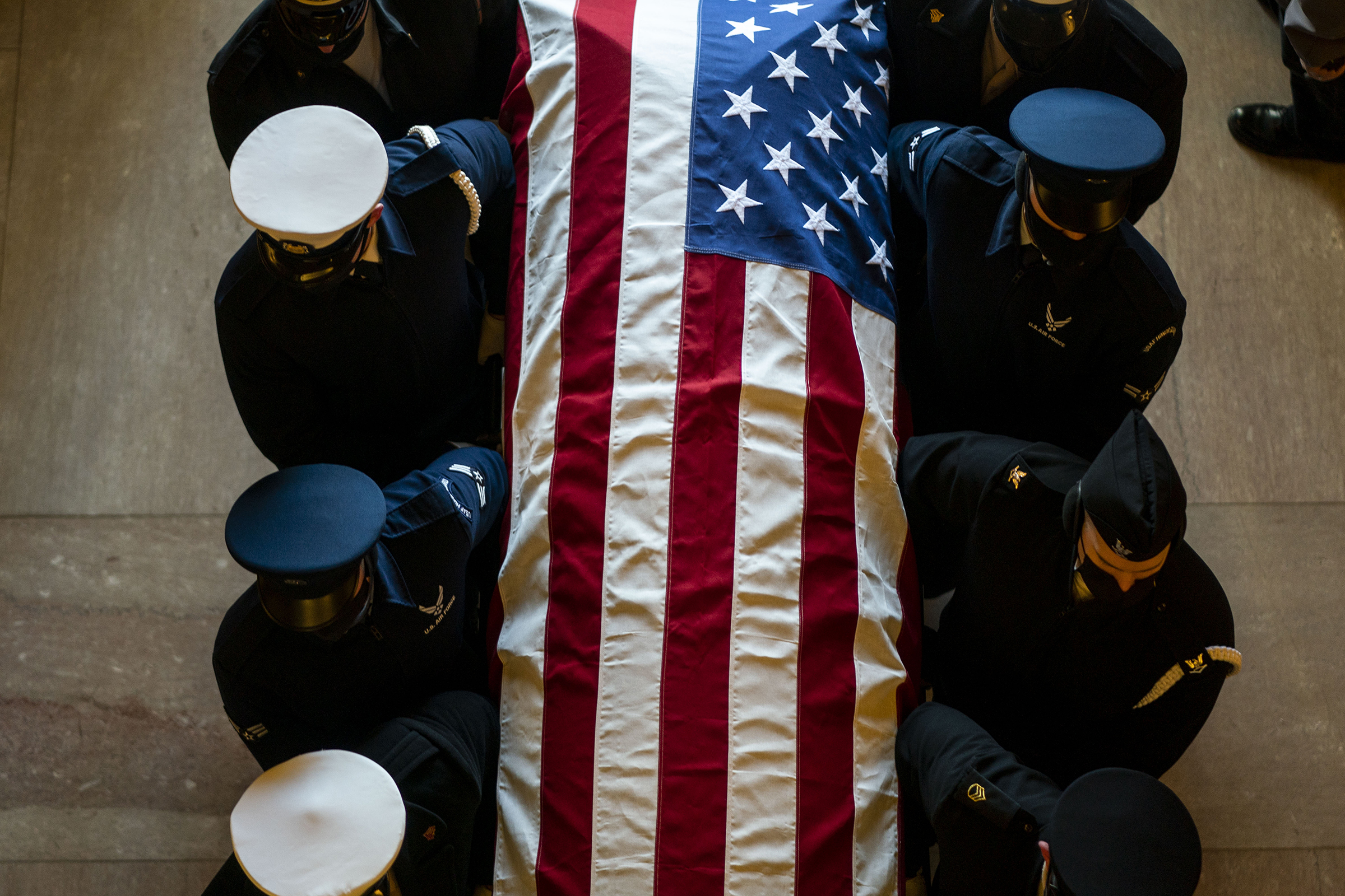 A military honor guard rehearses carrying a casket into the U.S. Capitol Building ahead of former Senate Majority Leader Harry Reid lying in state in the U.S. Capitol. (Kent Nishimura—Los Angeles Times/Getty Images)