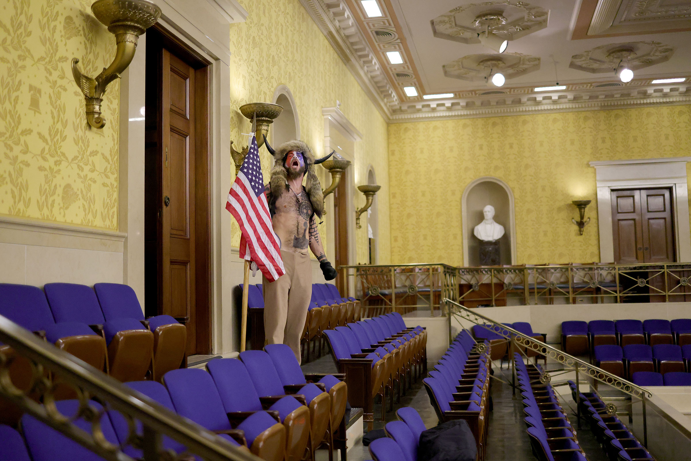 Jacob Anthony Chansley inside the Senate Chamber. (Win McNamee—Getty Images)