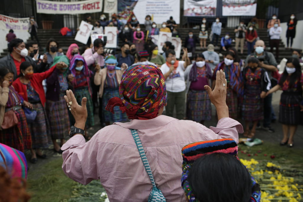 Maya Achí women perform an invocation of gratitude after the reading of the sentence on Jan. 24 2022 in Guatemala City, Guatemala. (Josue Decavele—Getty Images)