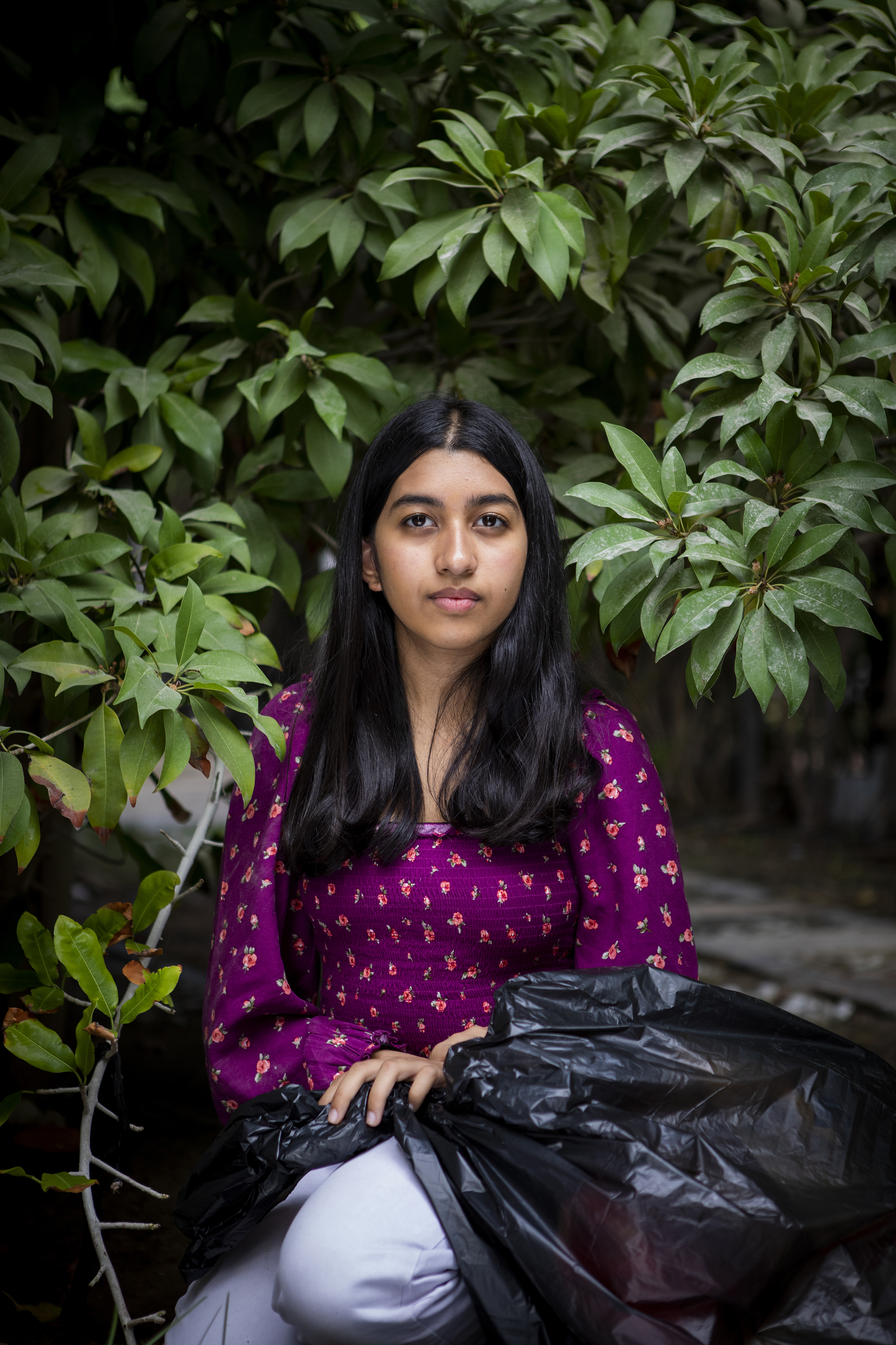 Sagarika Sriram, a teen climate activist, photographed outside her home on December 29th, 2021. (Natalie Naccache for TIME)